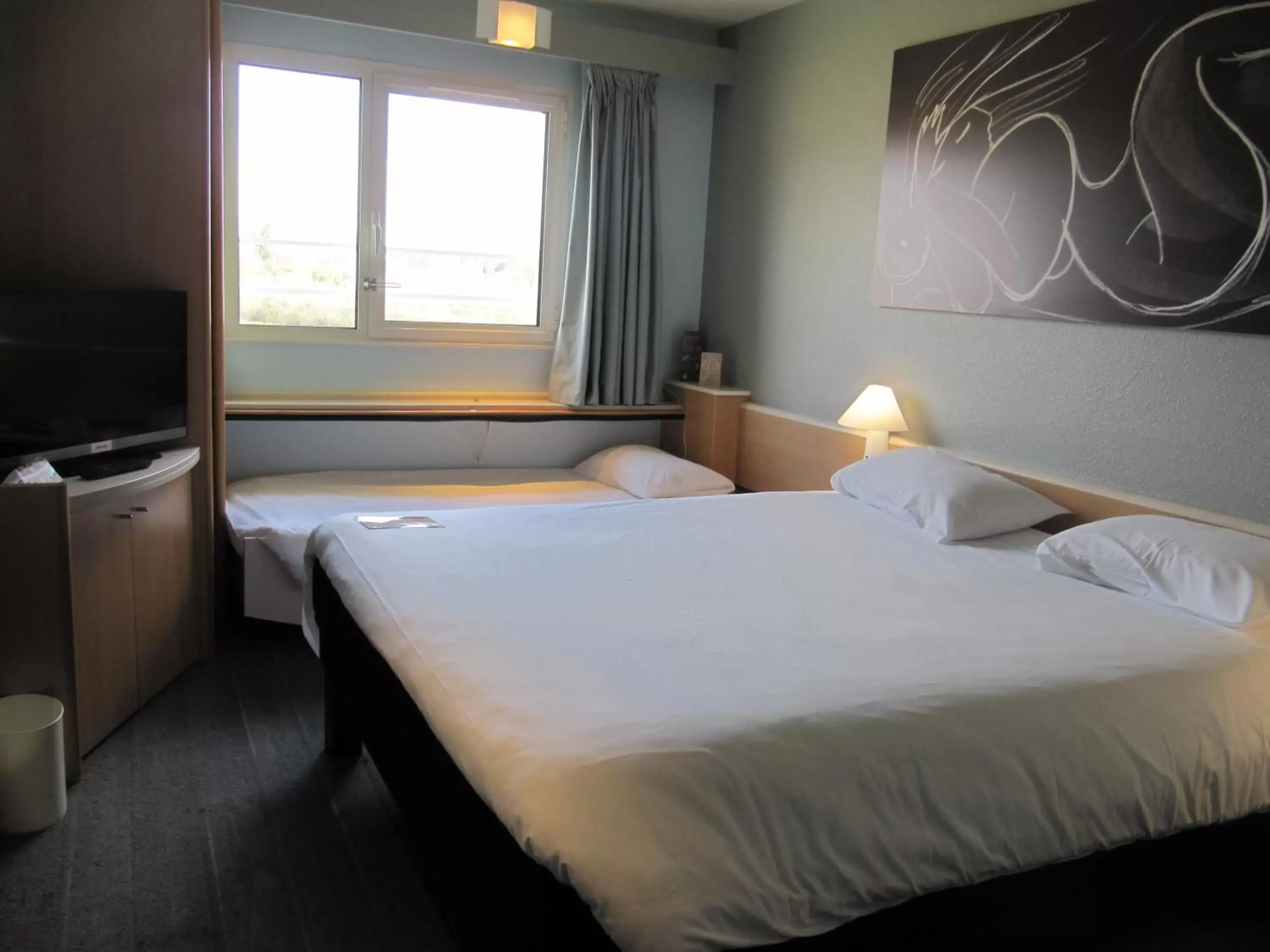 Bed in Hôtel ibis Pontivy