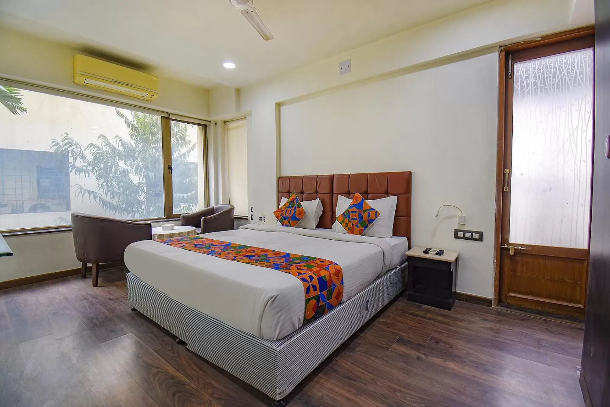 Bed in FabHotel SR Wakad - Nr Mall of Millenium Bed in FabHotel SR Wakad - Nr Mall of Millenium