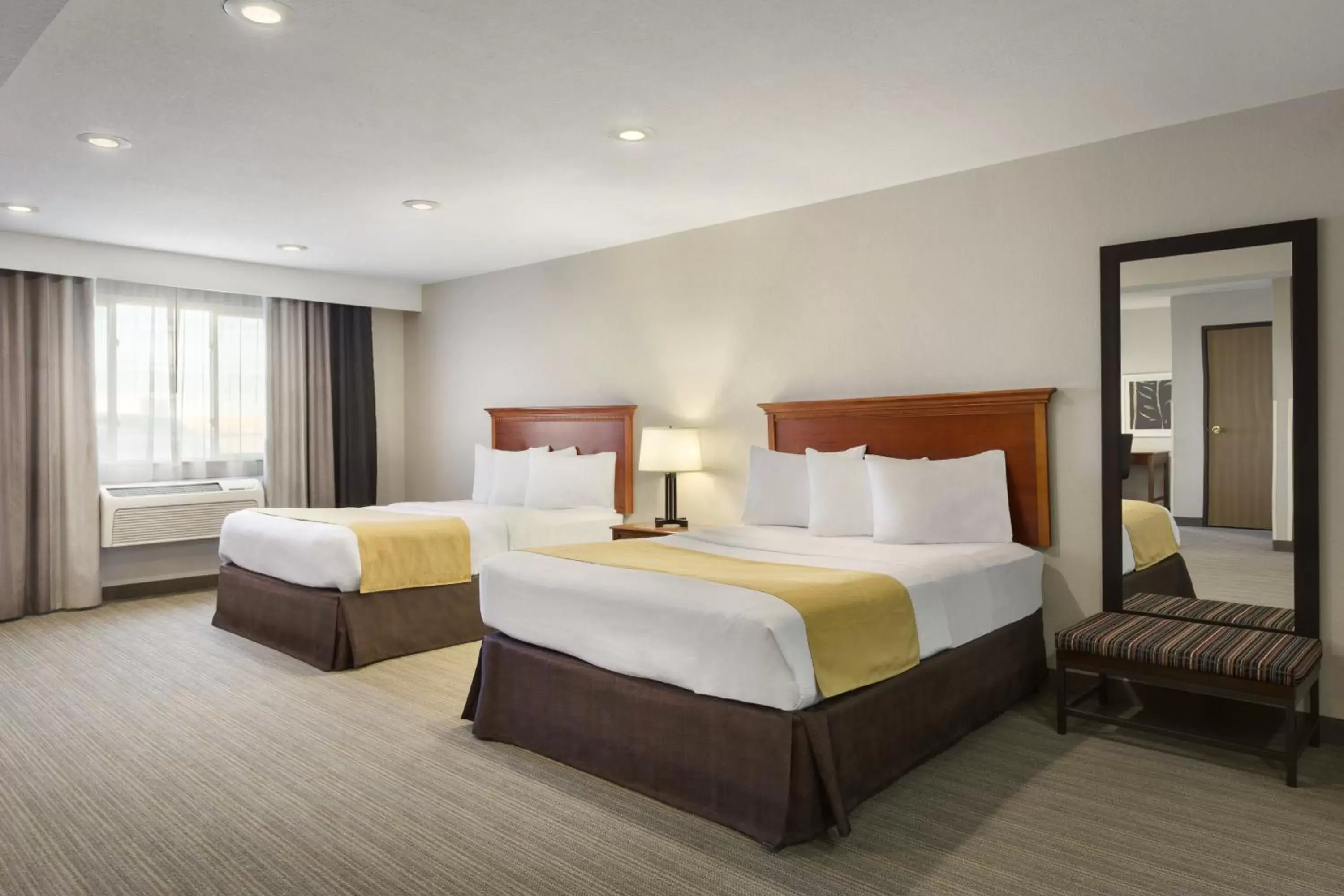 Bed in Country Inn & Suites by Radisson, Sidney, NE