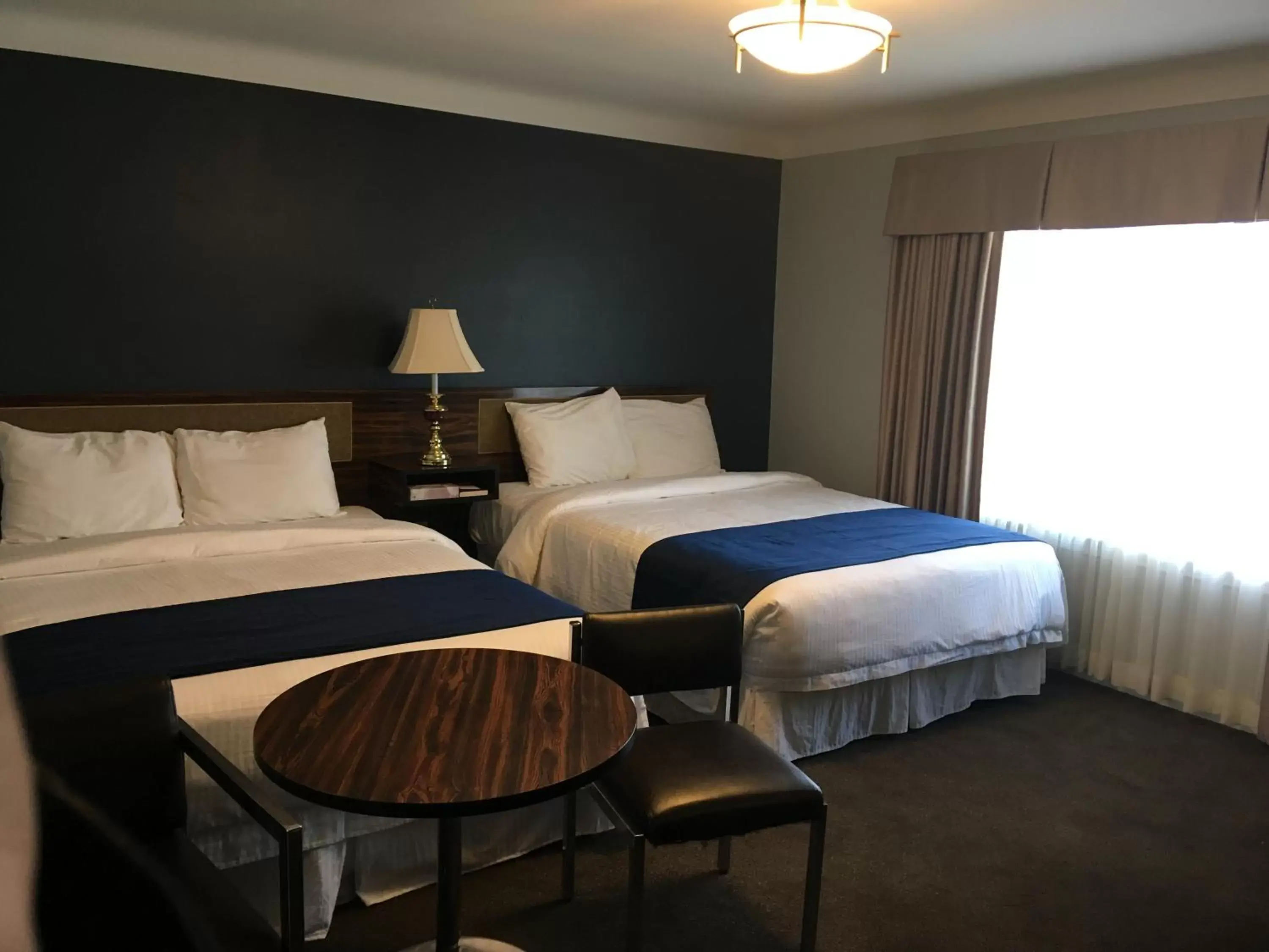 Bed in Falls Manor Resort