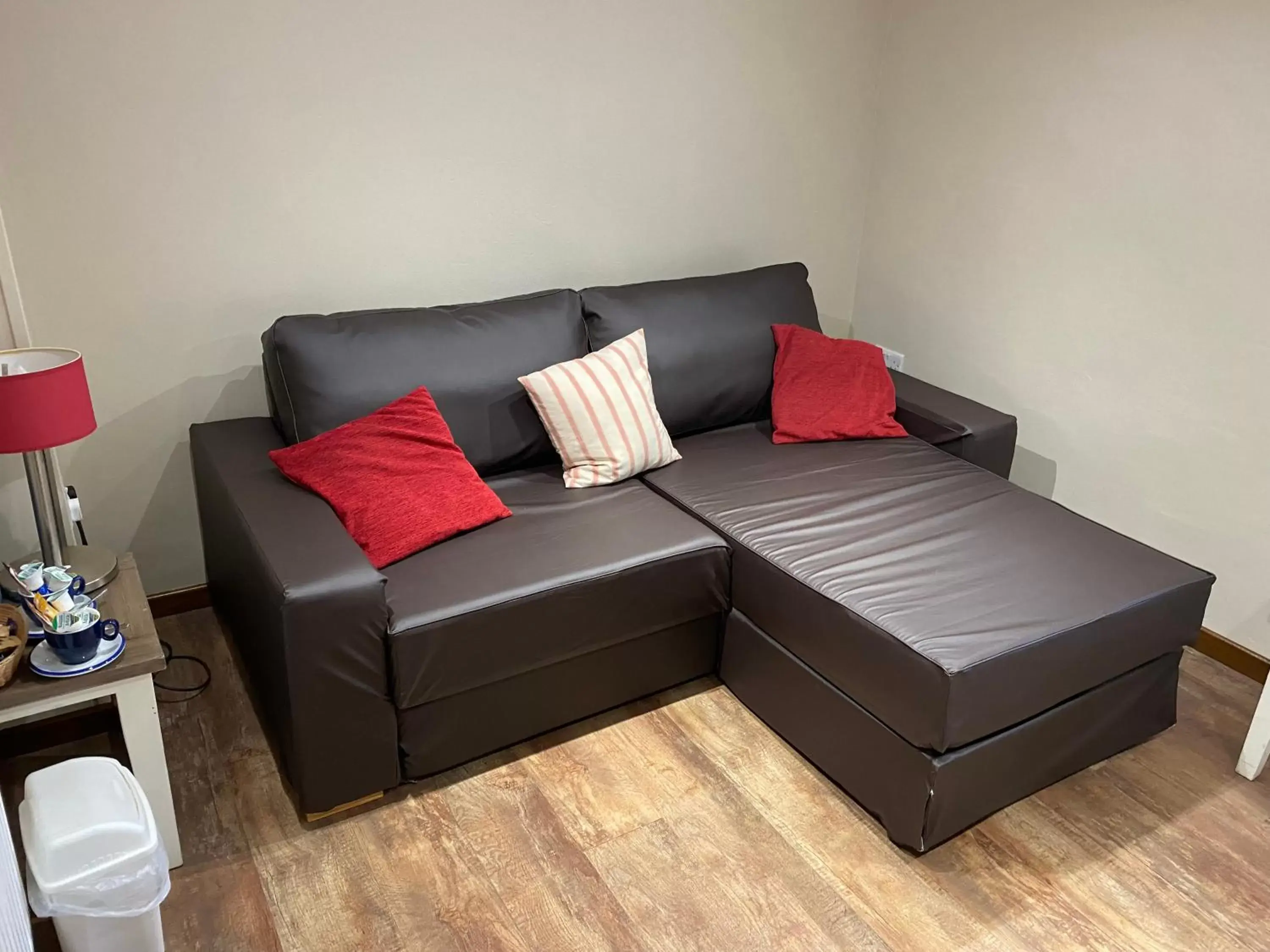 Seating area, Bed in Grapes Hotel, Bar & Restaurant