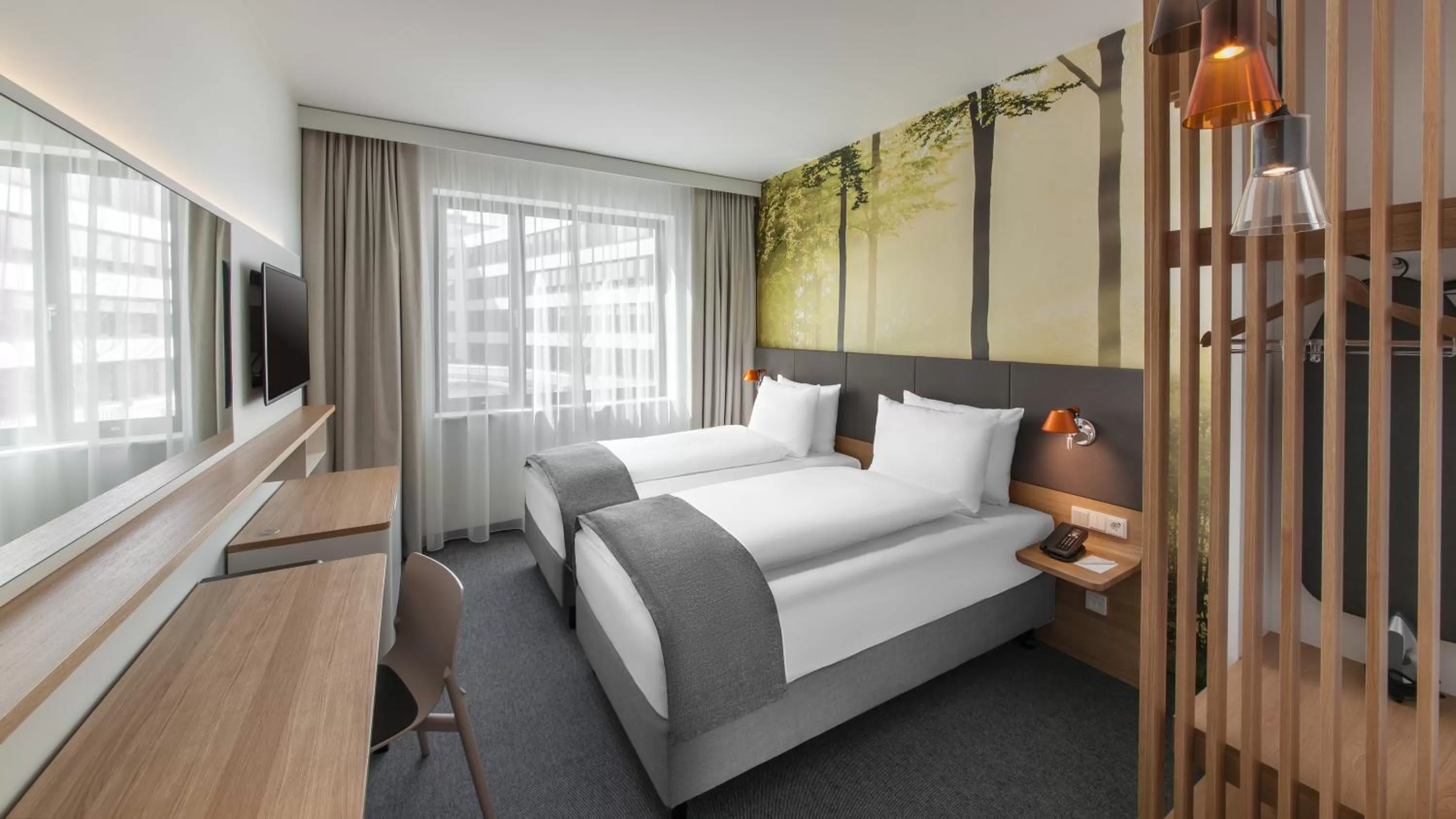 Photo of the whole room, Bed in Holiday Inn Munich - Leuchtenbergring by IHG