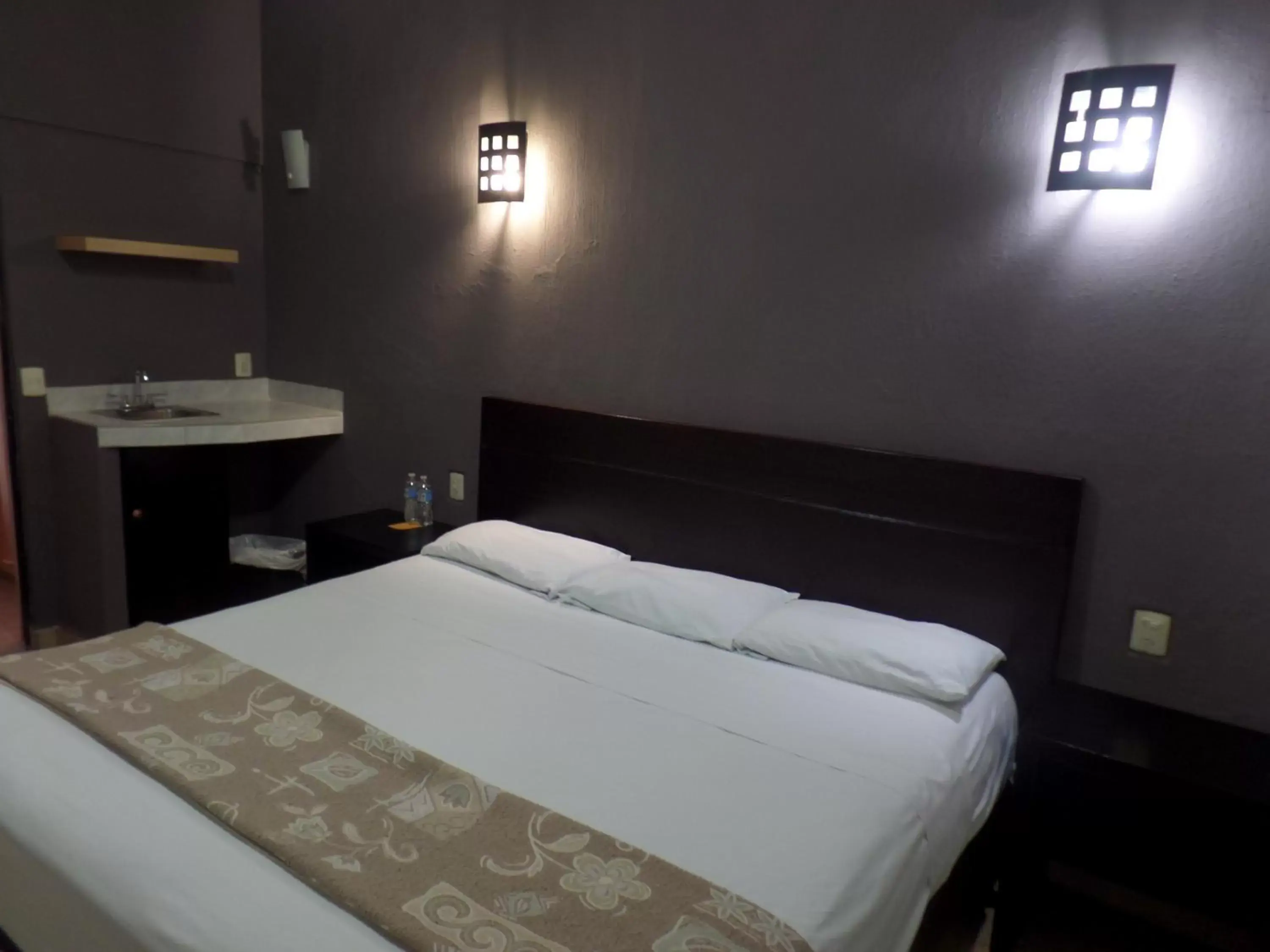 Bed in Uke Inn Hotel & Suites Xamaipak