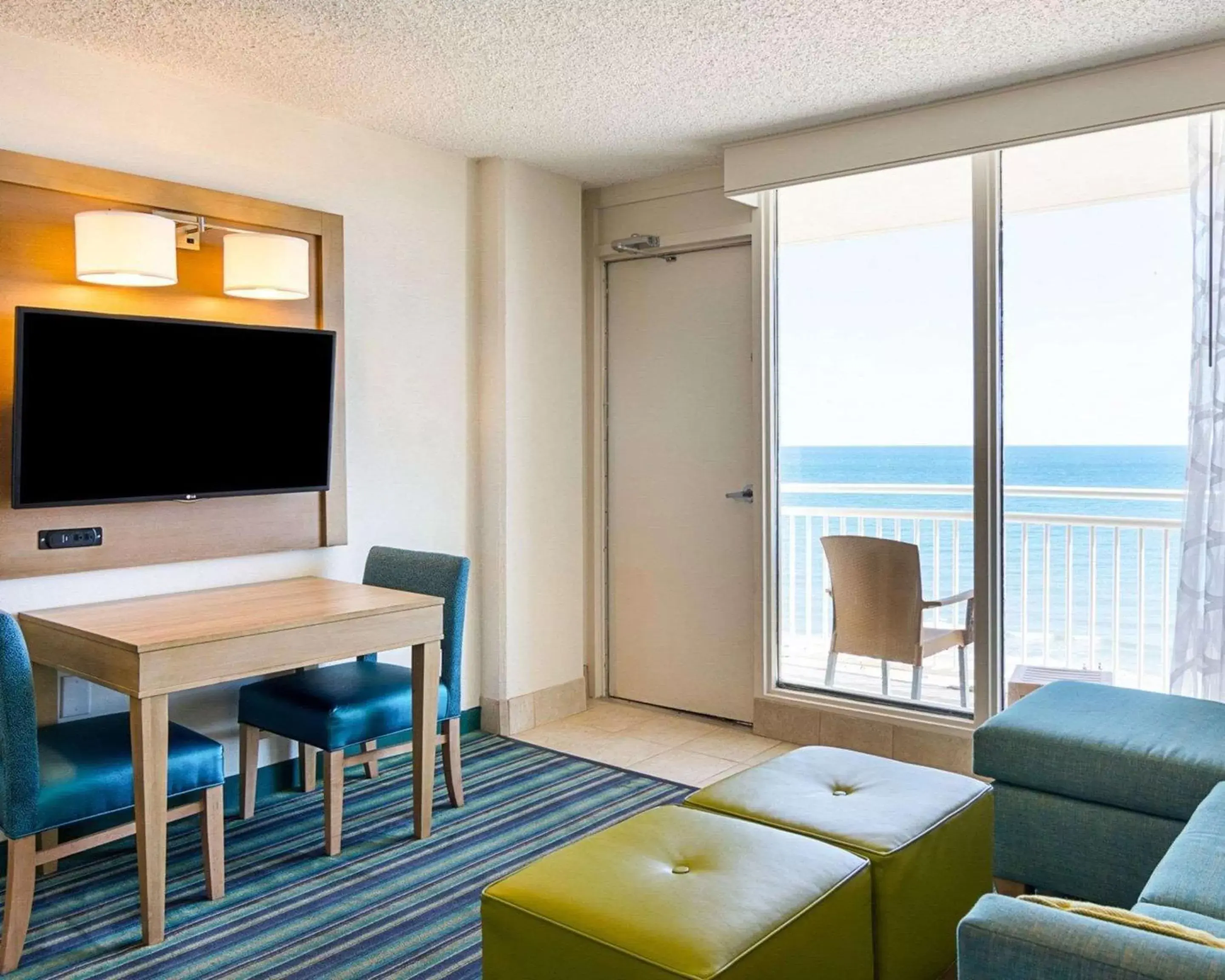 Photo of the whole room, TV/Entertainment Center in Comfort Suites Beachfront