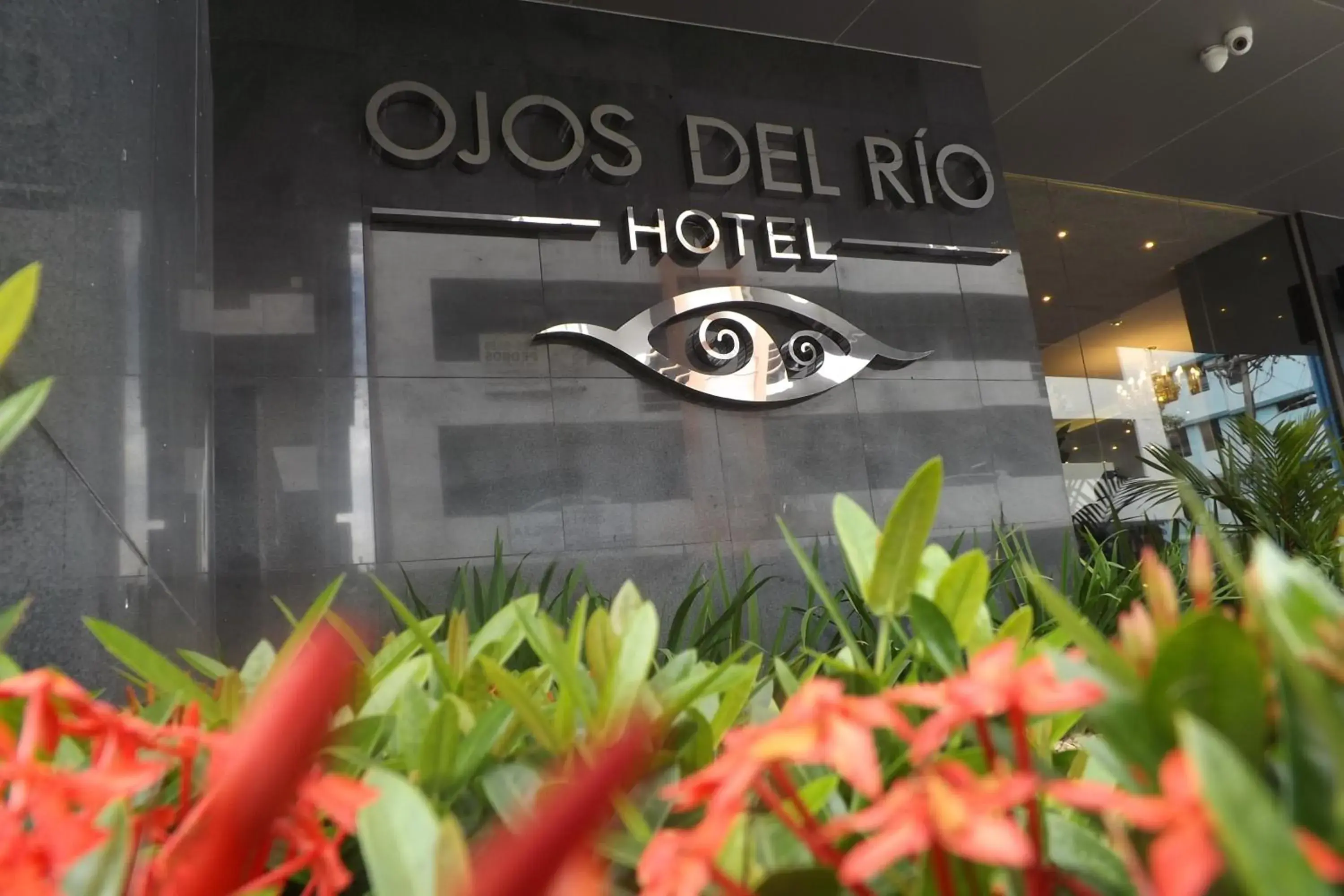 Property building, Property Logo/Sign in Hotel Ojos Del Rio