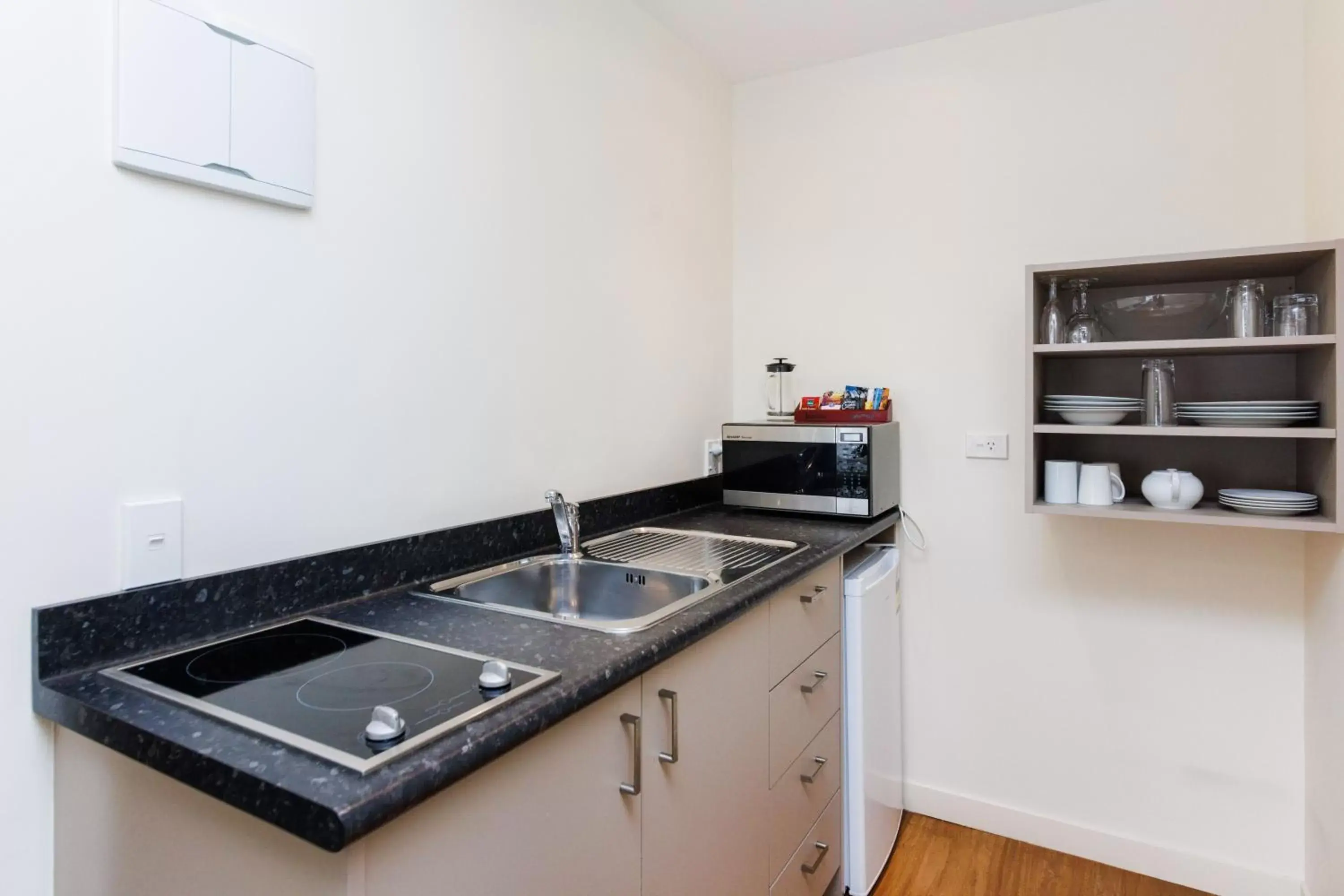 Kitchen or kitchenette, Kitchen/Kitchenette in Fitzherbert Regency Motor Lodge