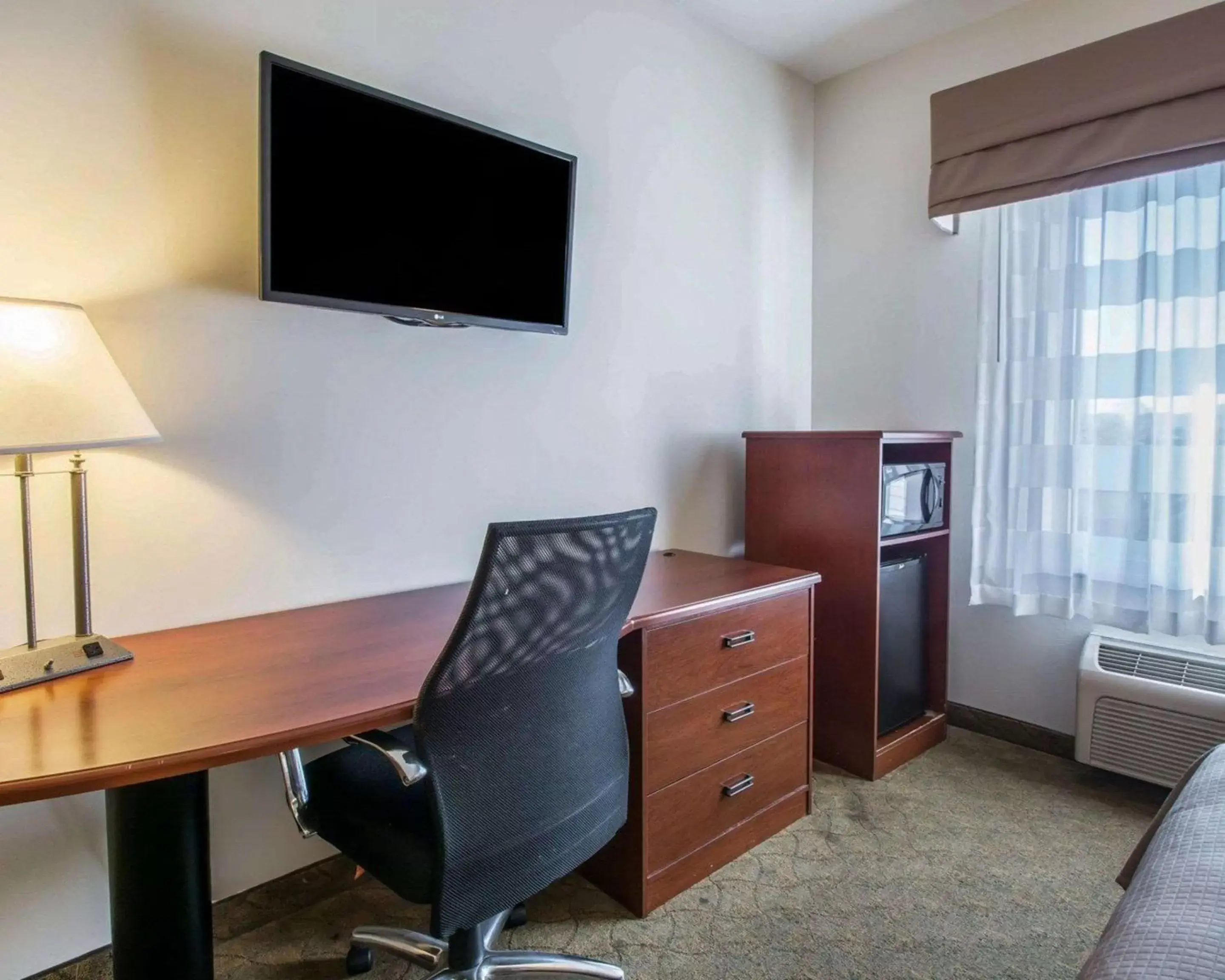 Photo of the whole room, TV/Entertainment Center in Sleep Inn & Suites Panama City Beach