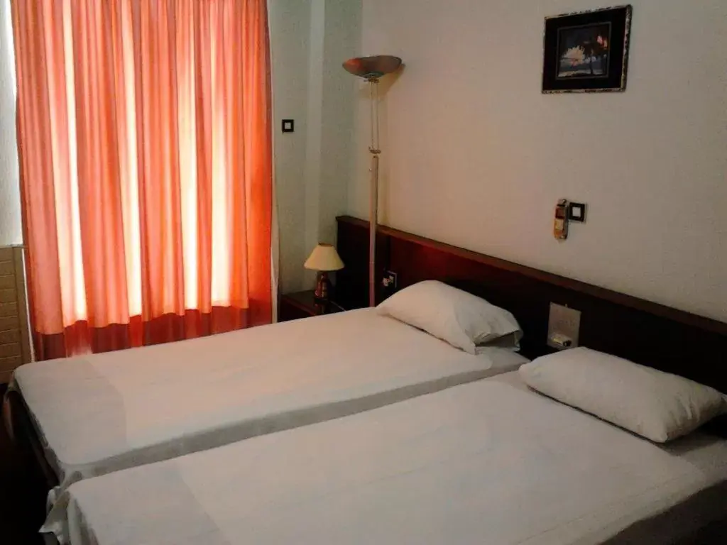Bed in HOTEL ALEXANDROS