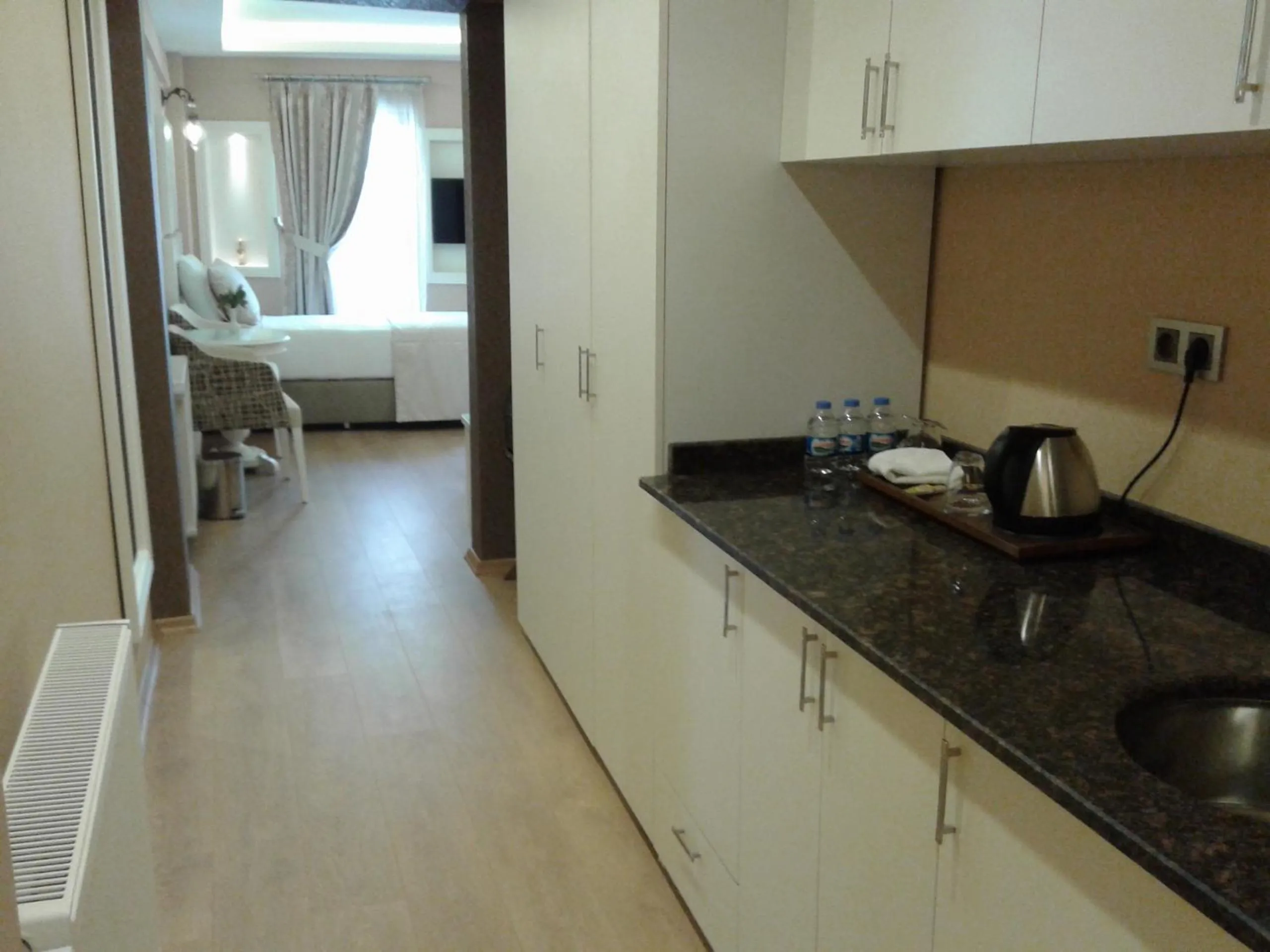 Kitchen or kitchenette, Bed in Rooms Inn Taxim
