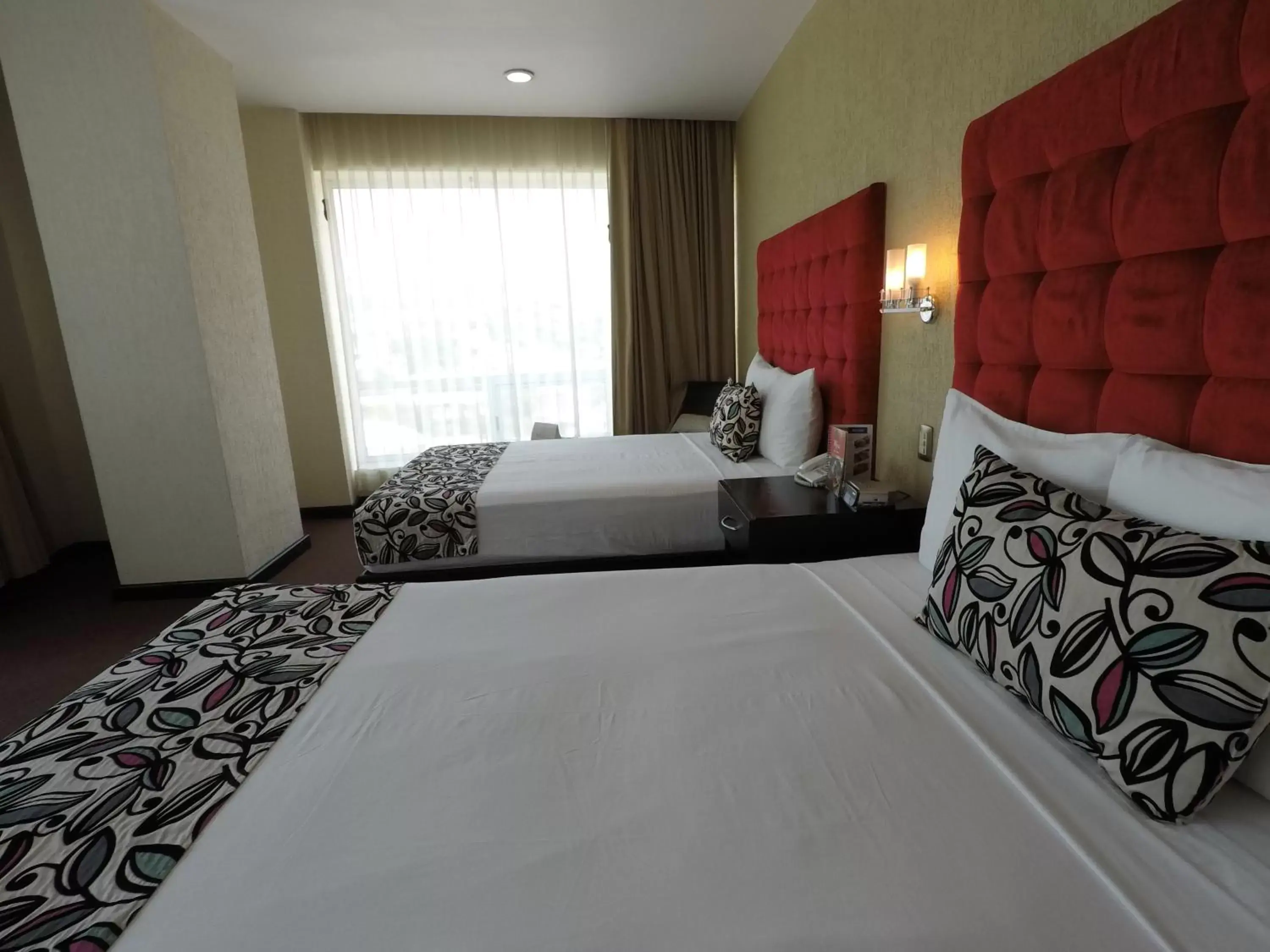 Bed in Hotel Vista Inn Premium