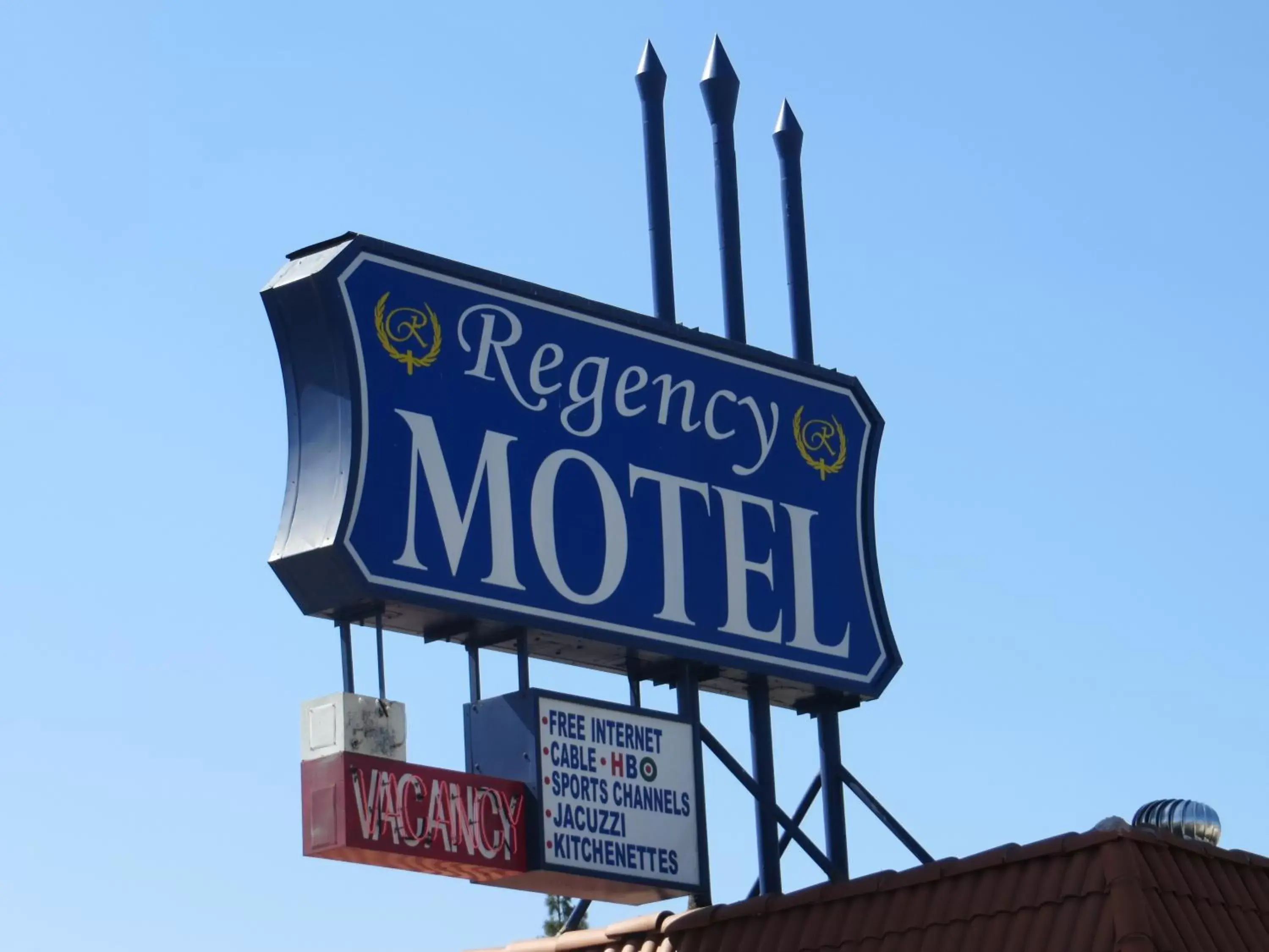 Property logo or sign in Regency Motel