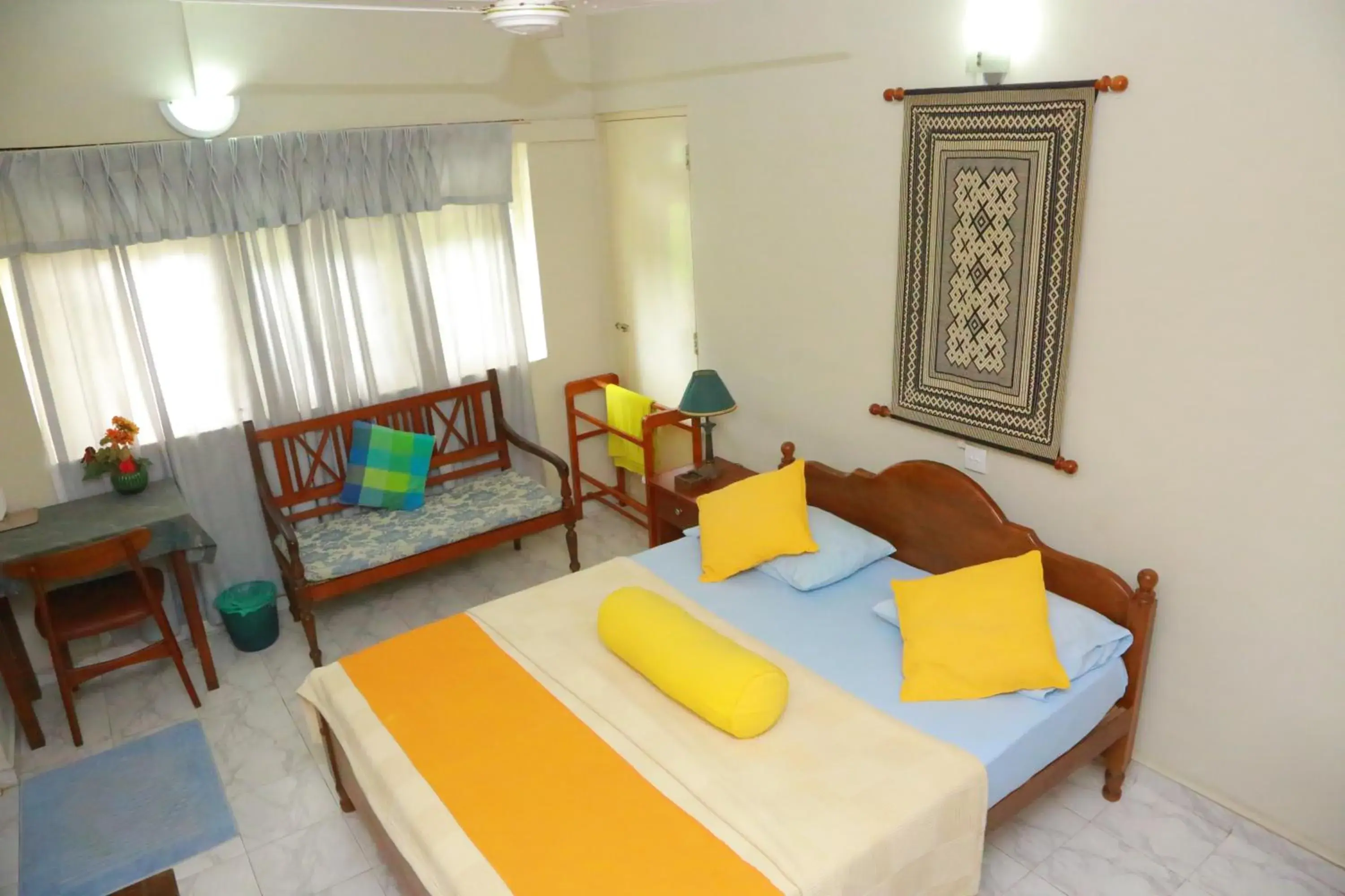 Bed, Seating Area in Ranveli Beach Resort