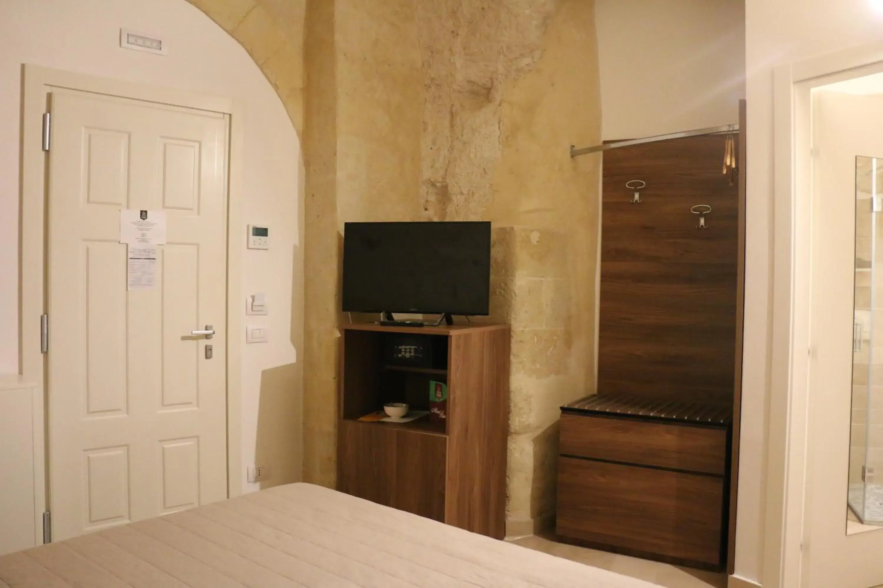 TV/Entertainment Center in Albergo Del Sedile