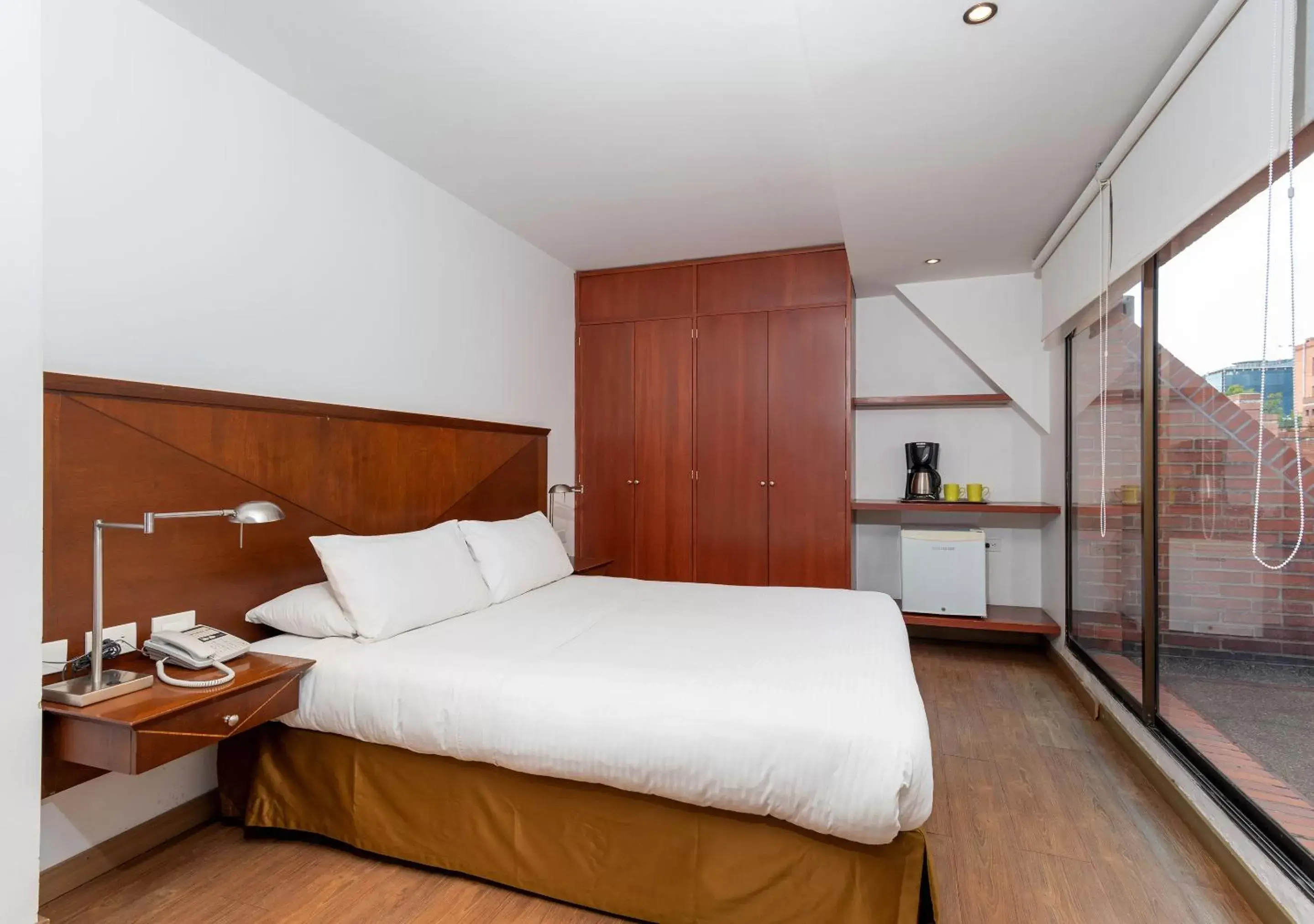 Bedroom, Bed in GIO Suites Parque 93 Bogotá