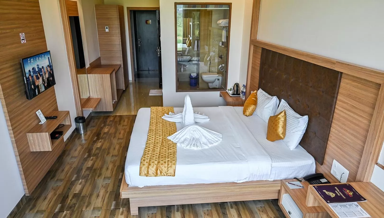 Bed in Hotel Laxmi Empire