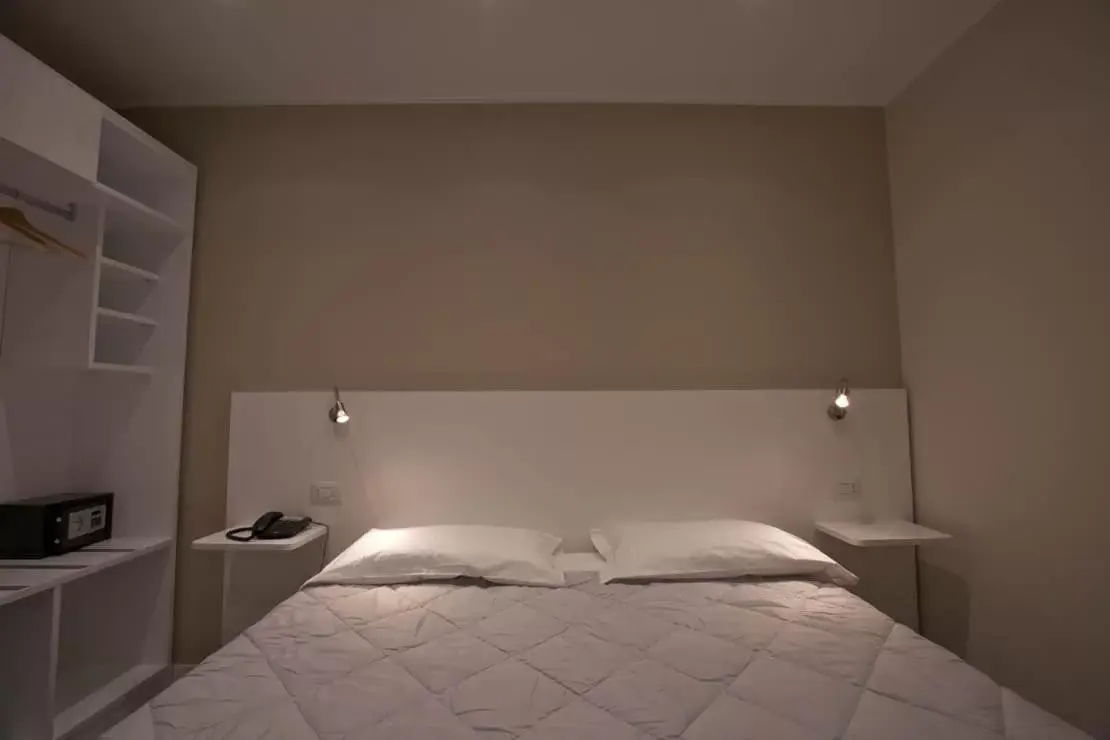 Bed in Onorati Hotel