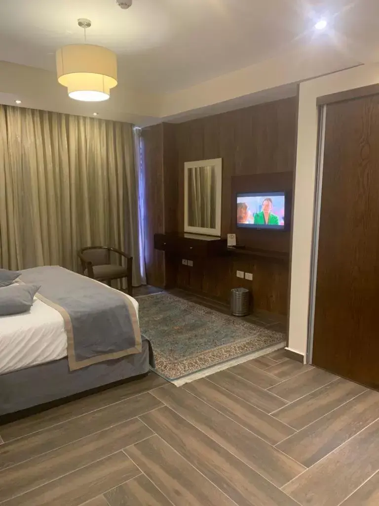 Bed in City Rose Hotel Suites Bed in City Rose Hotel Suites