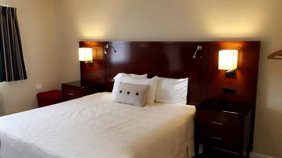 Bed in Sand Pebble Motor Lodge