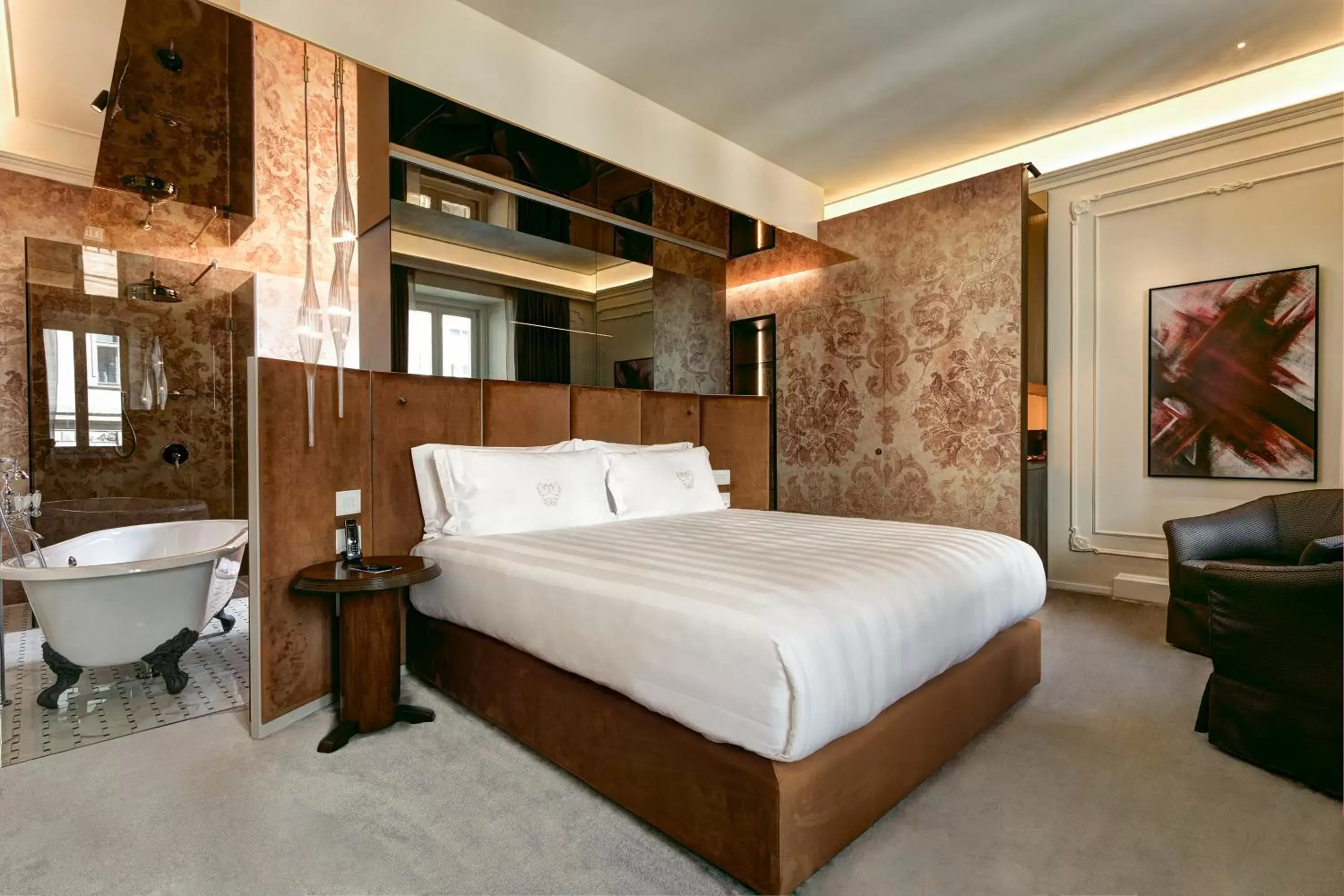 Bed in Grand Hotel Duchi d'Aosta