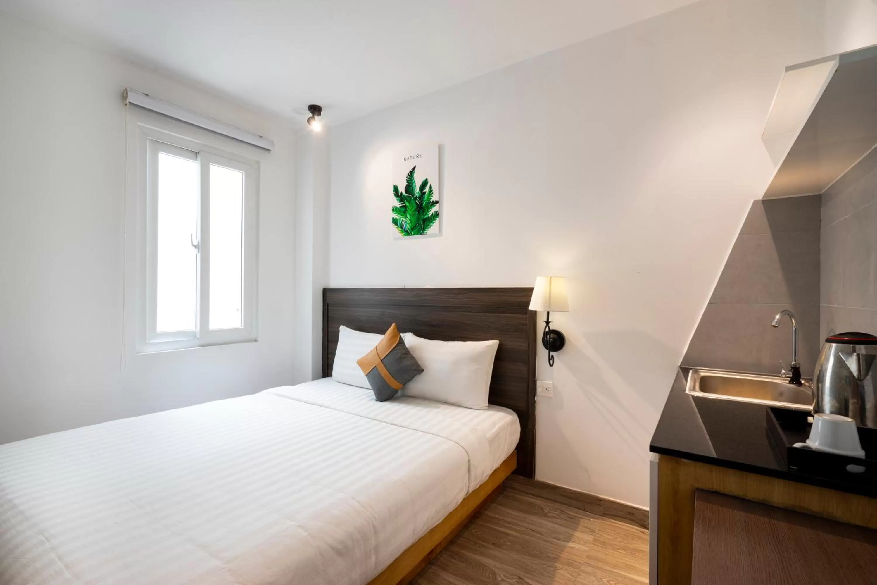 Photo of the whole room, Bed in La Airport Tan Binh Hotel