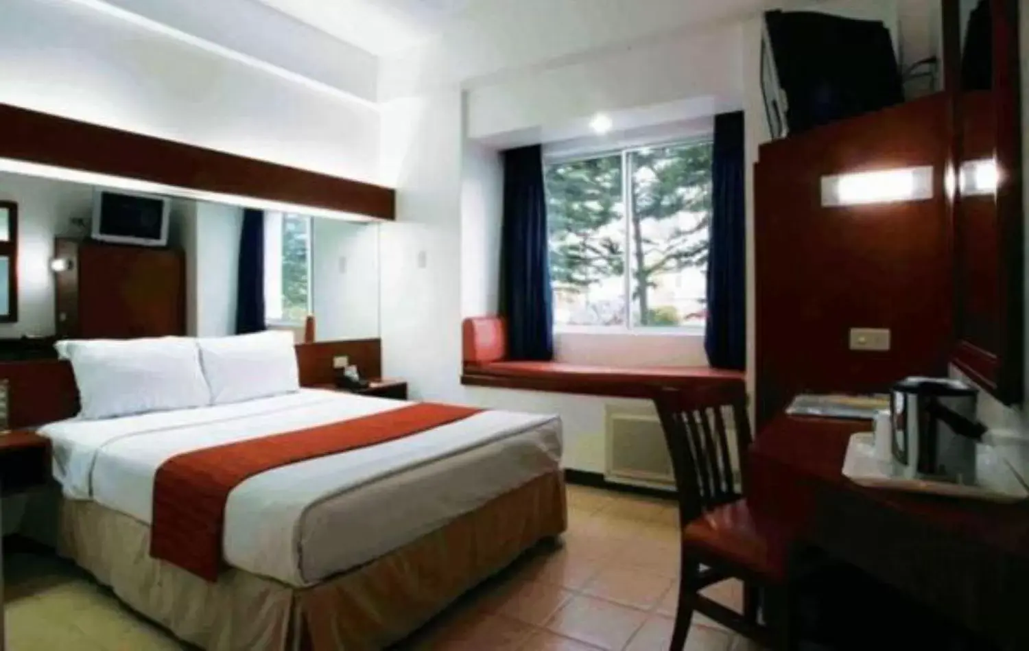 Bed in Microtel by Wyndham Baguio