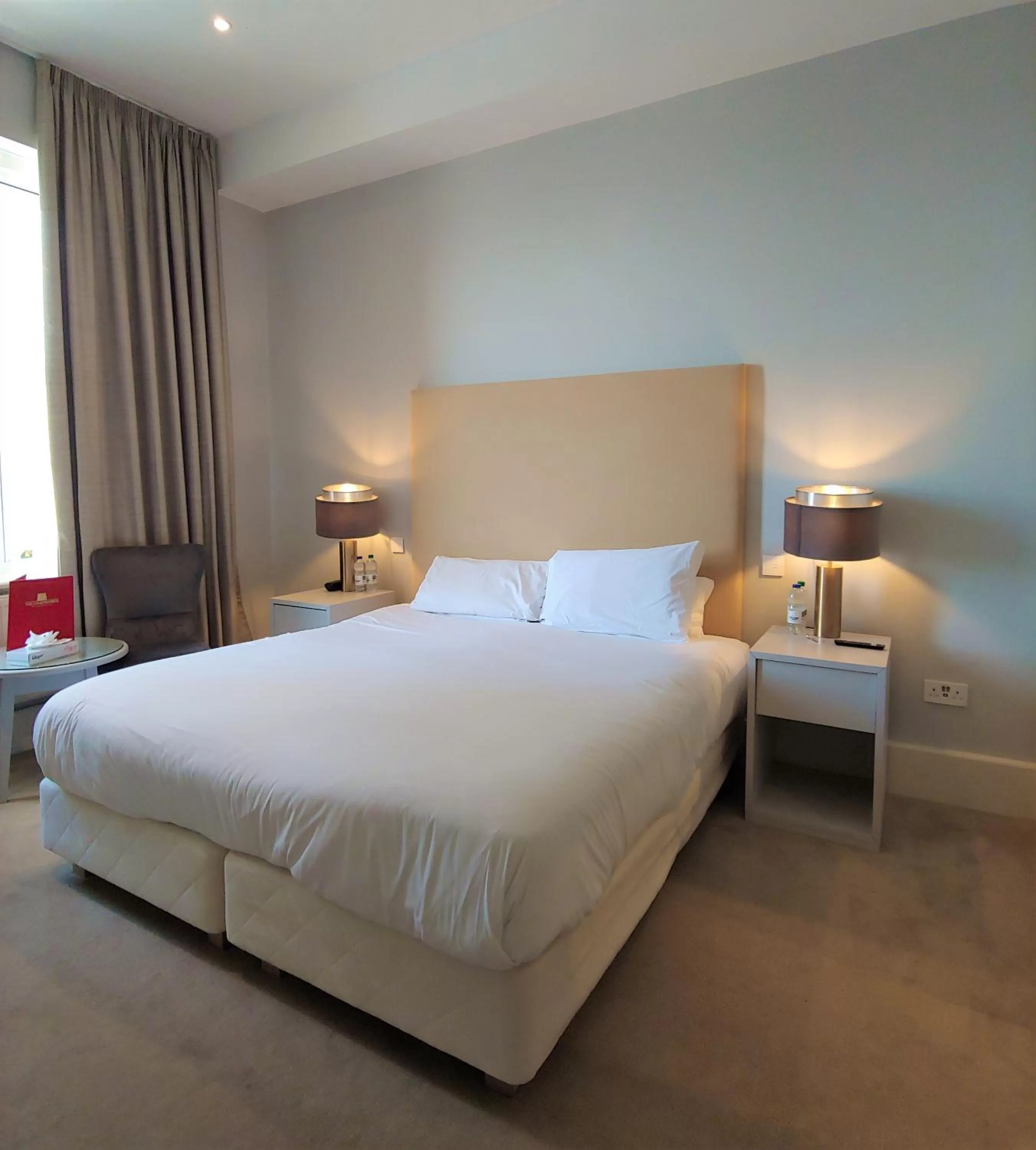 Bed in The Chatsworth Hotel