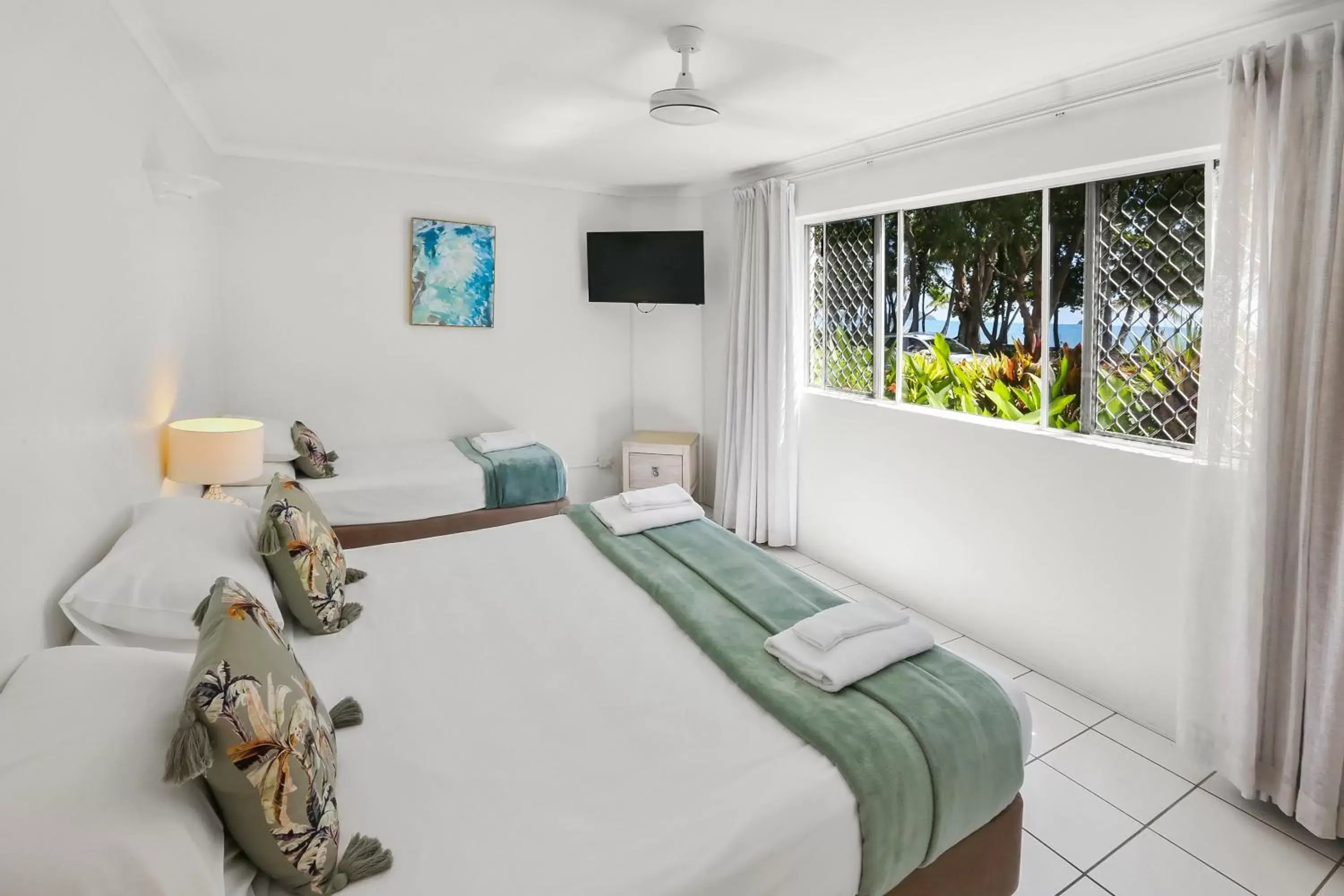 Bedroom in Agincourt Beachfront Apartments