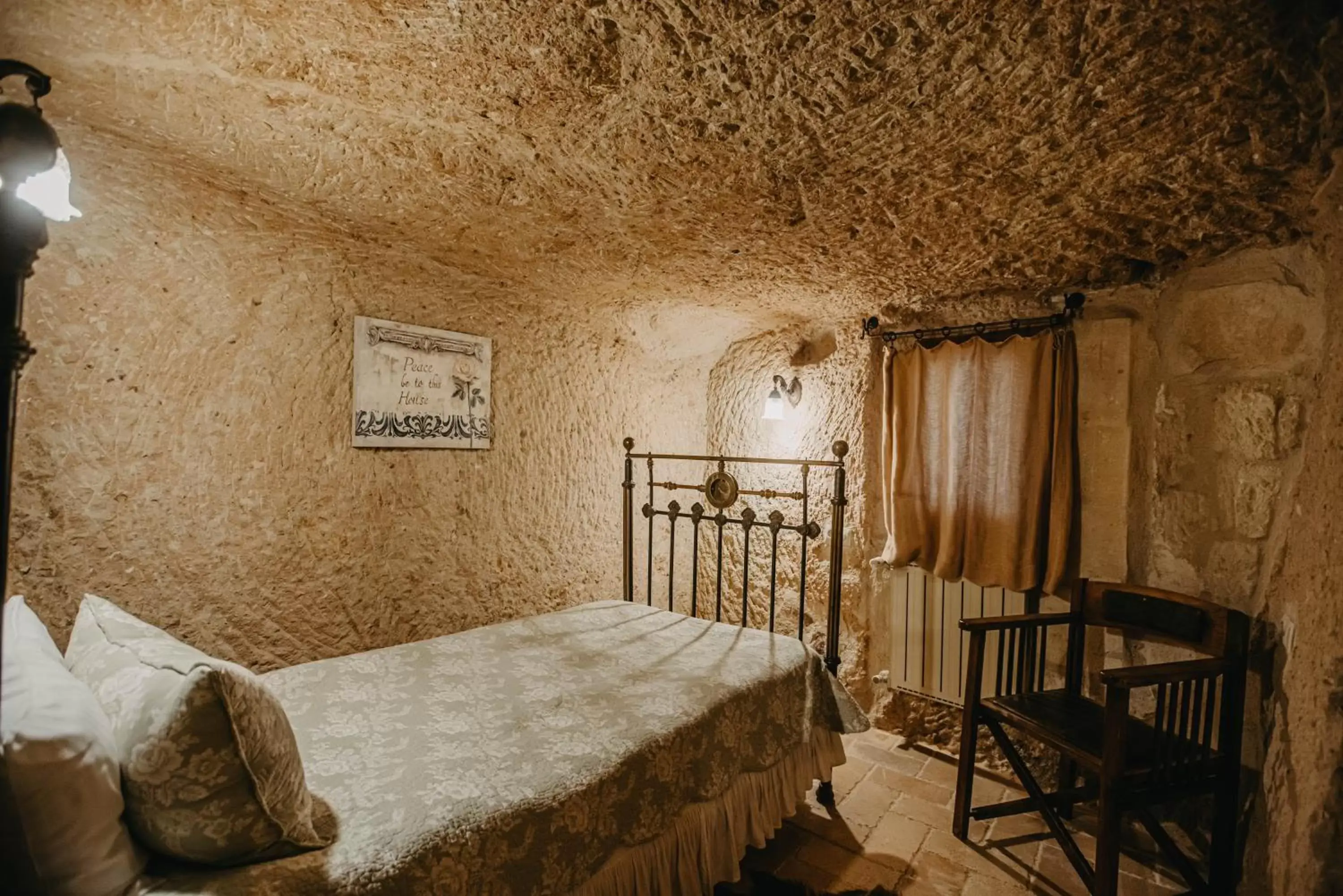Bed in Melekler Evi Cave Hotel