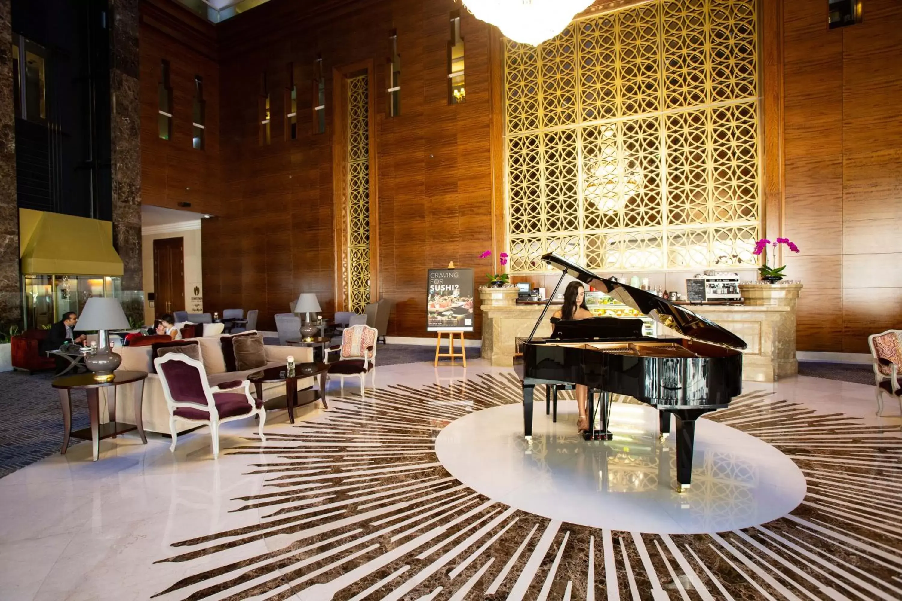 Lobby or reception in Millennium Hotel Doha