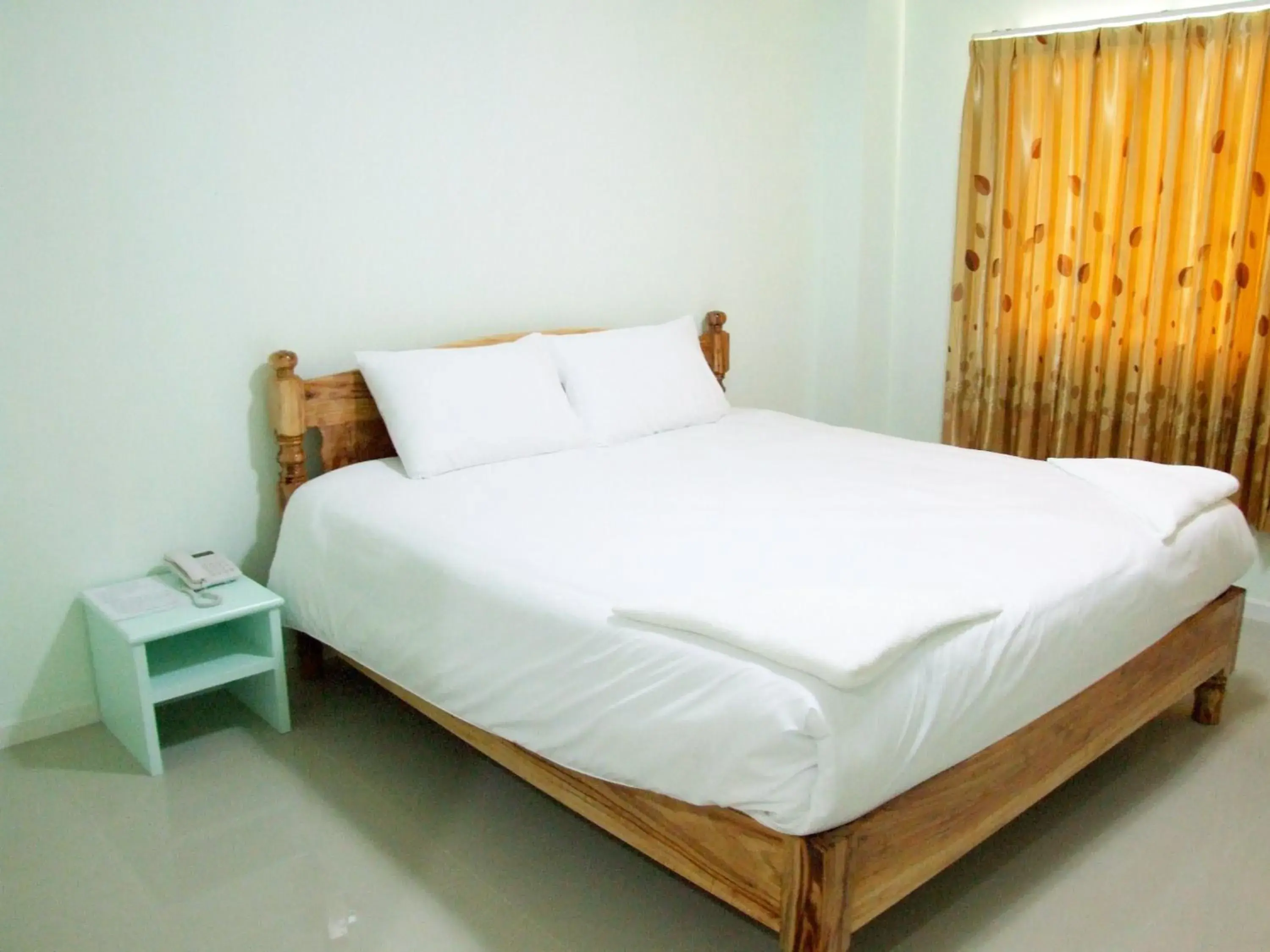 Bed in Rueanrimnam Hotel