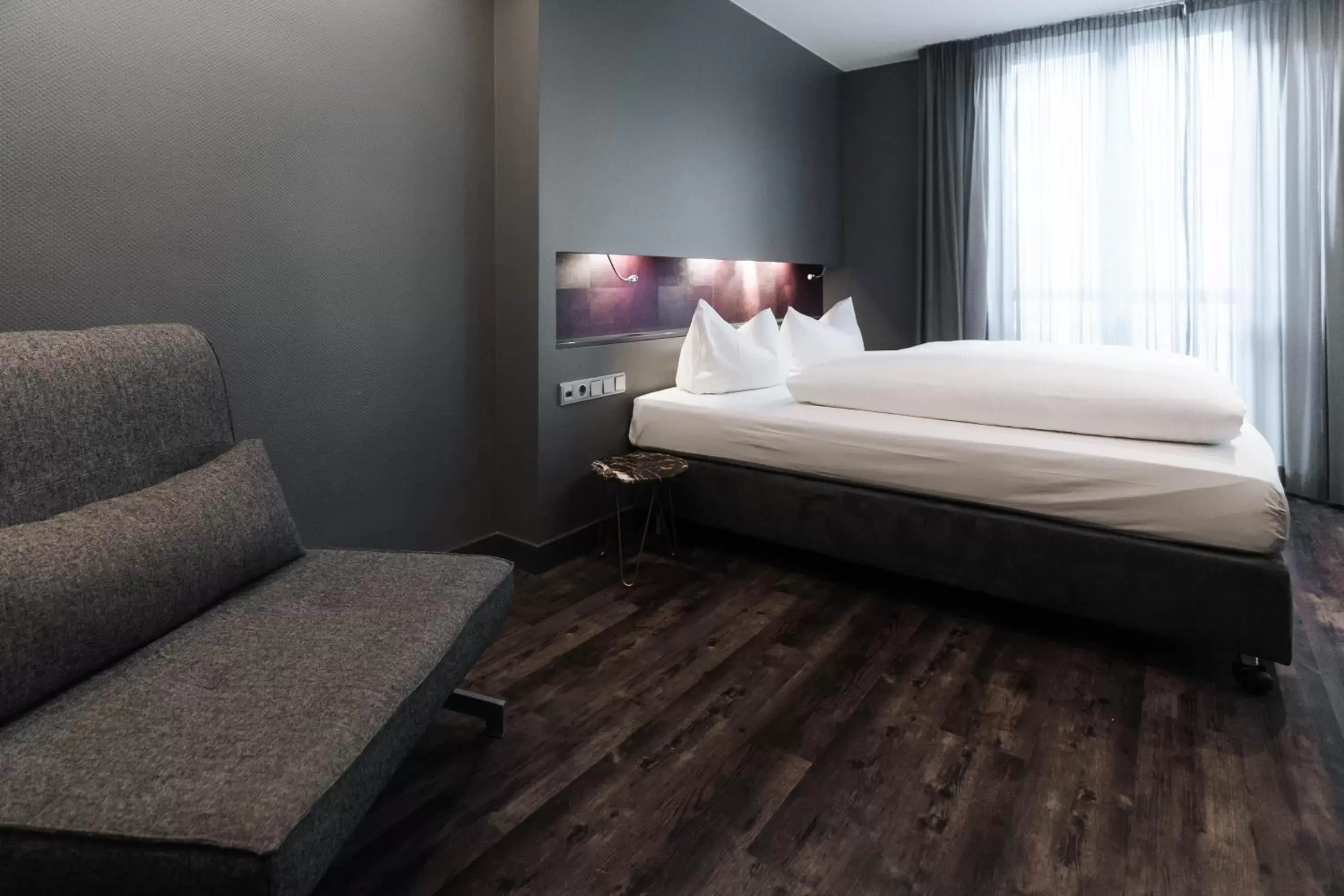 Bed in Hotel am Augustinerplatz Bed in Hotel am Augustinerplatz