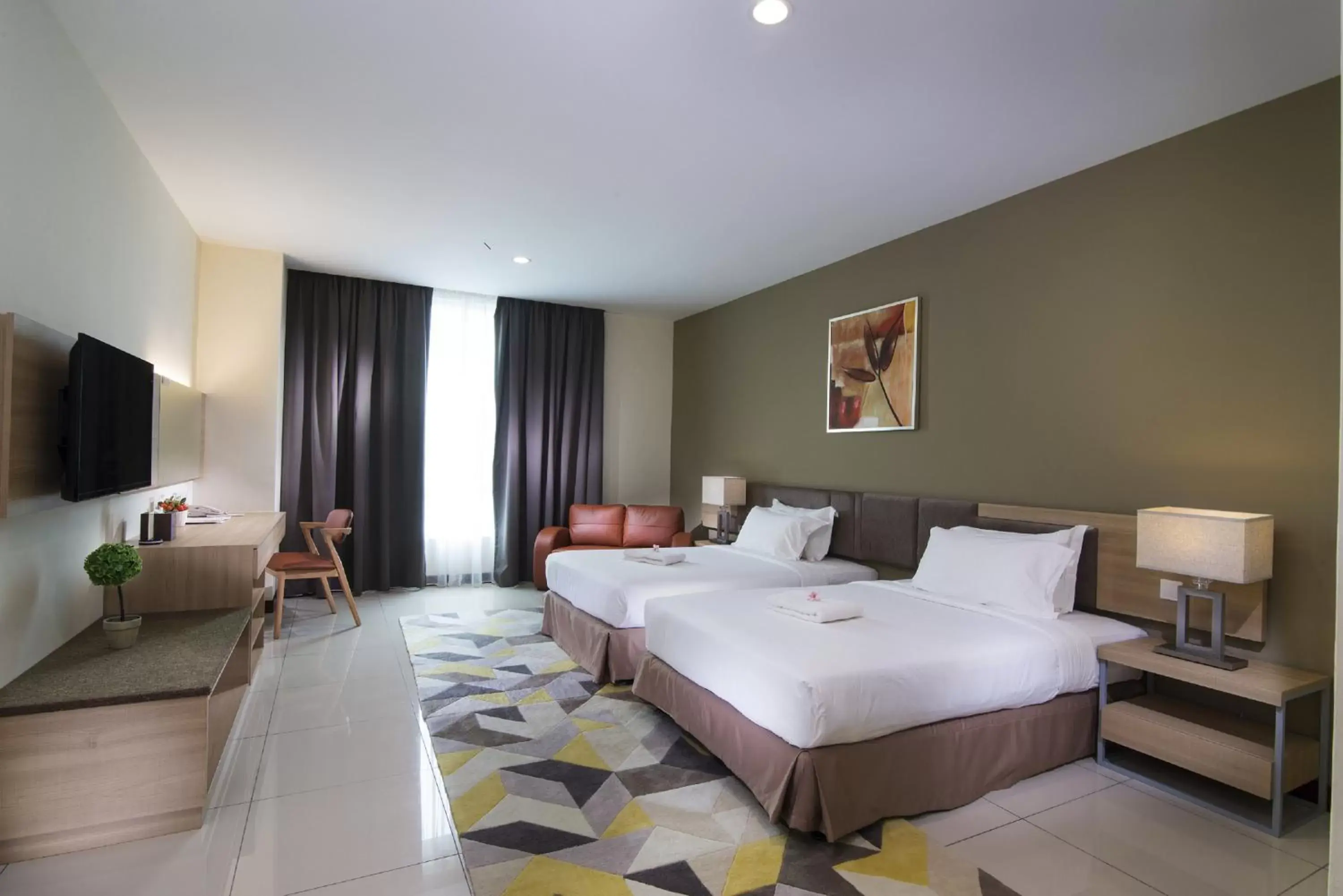 Bed in One Pacific Hotel and Serviced Apartments