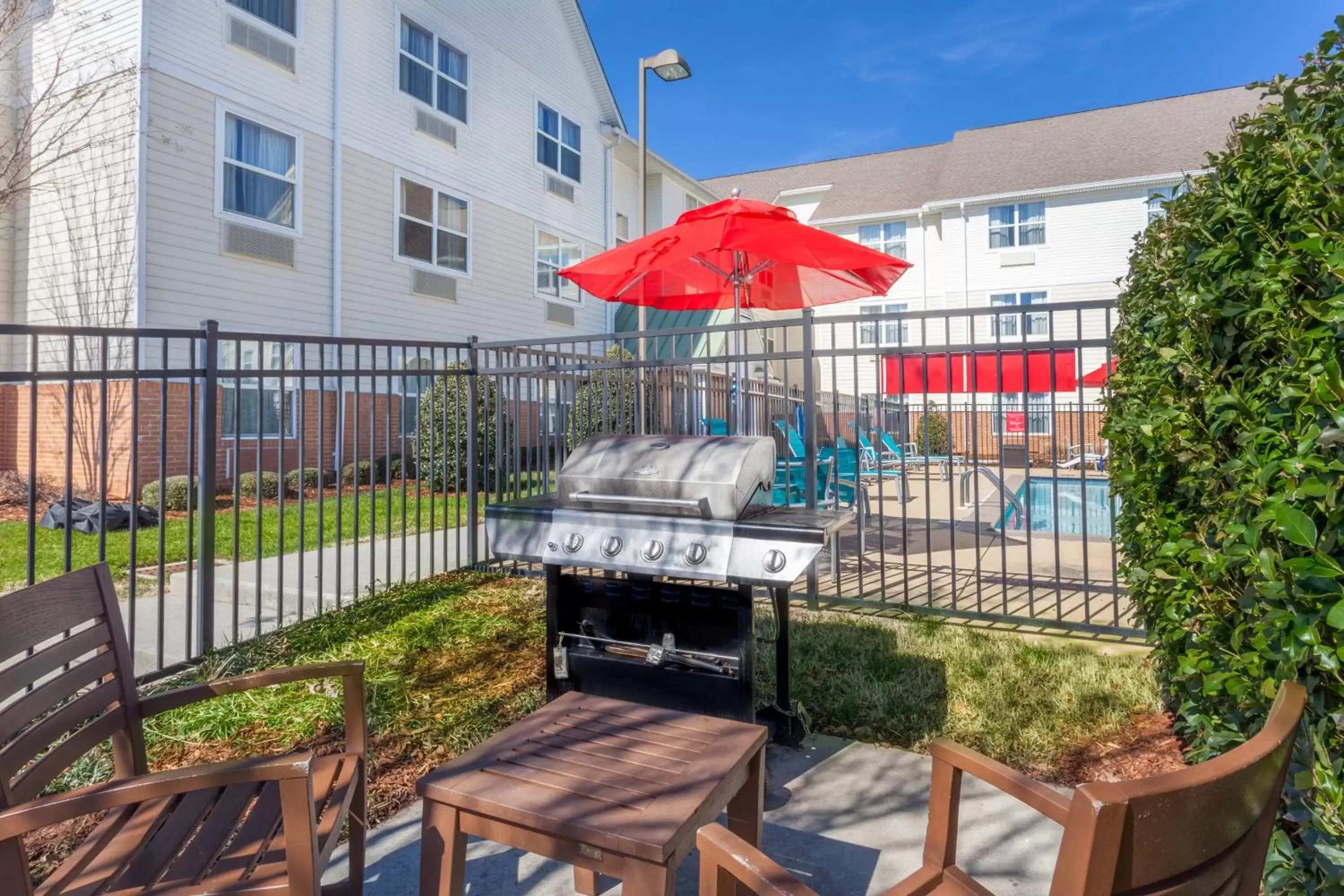 Property building, BBQ Facilities in TownePlace Suites Huntsville