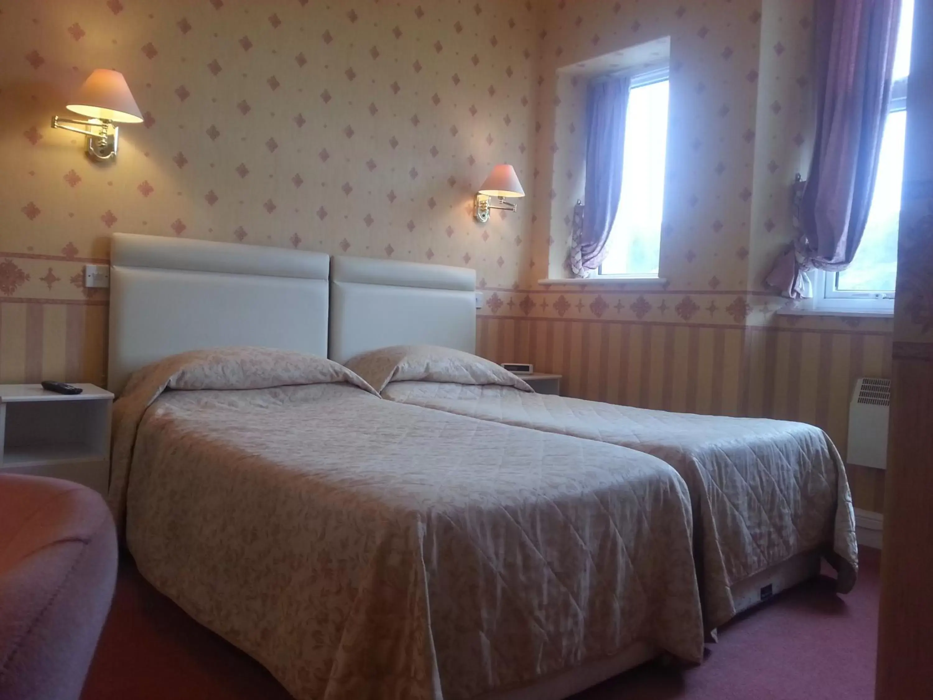 Bed in White Heather Hotel
