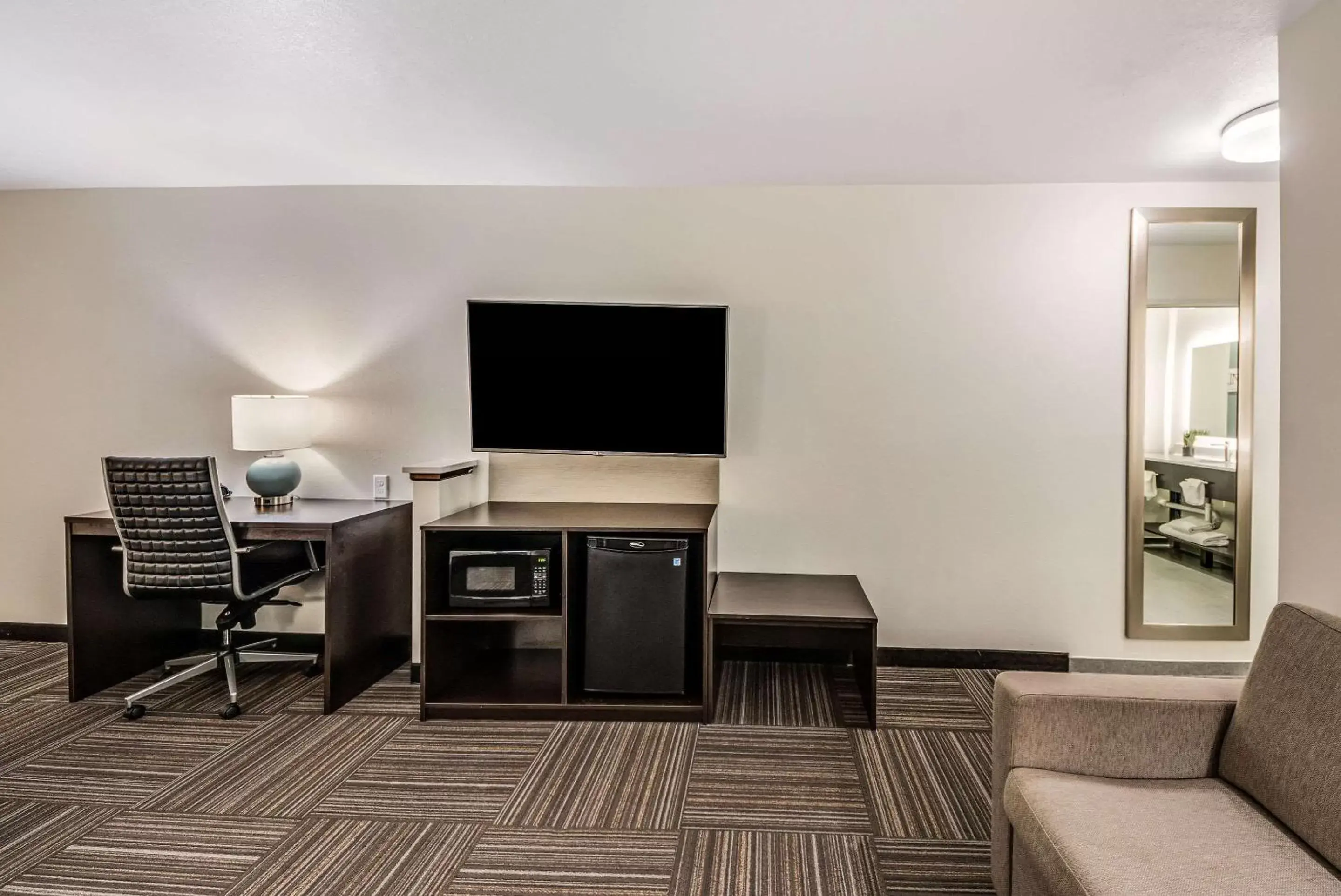 Photo of the whole room, TV/Entertainment Center in Sleep Inn & Suites