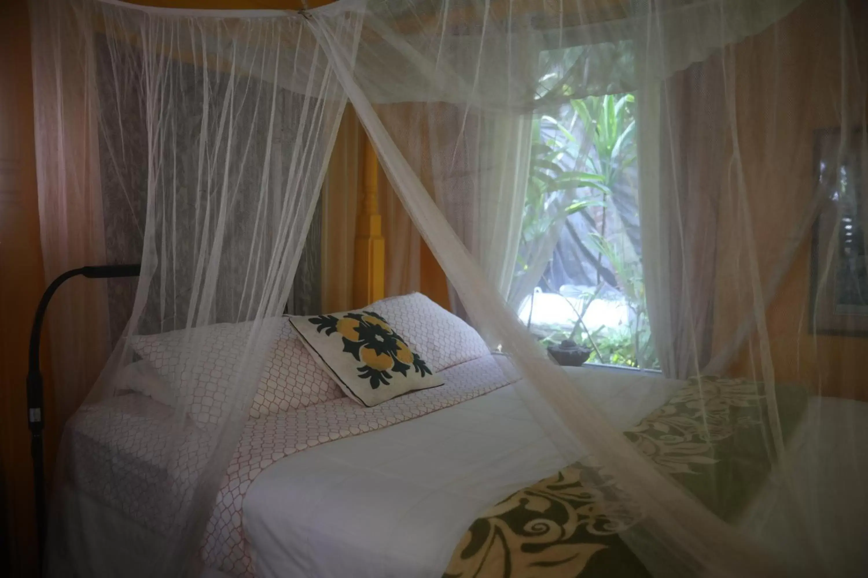 Bed in Ma'ukele Lodge