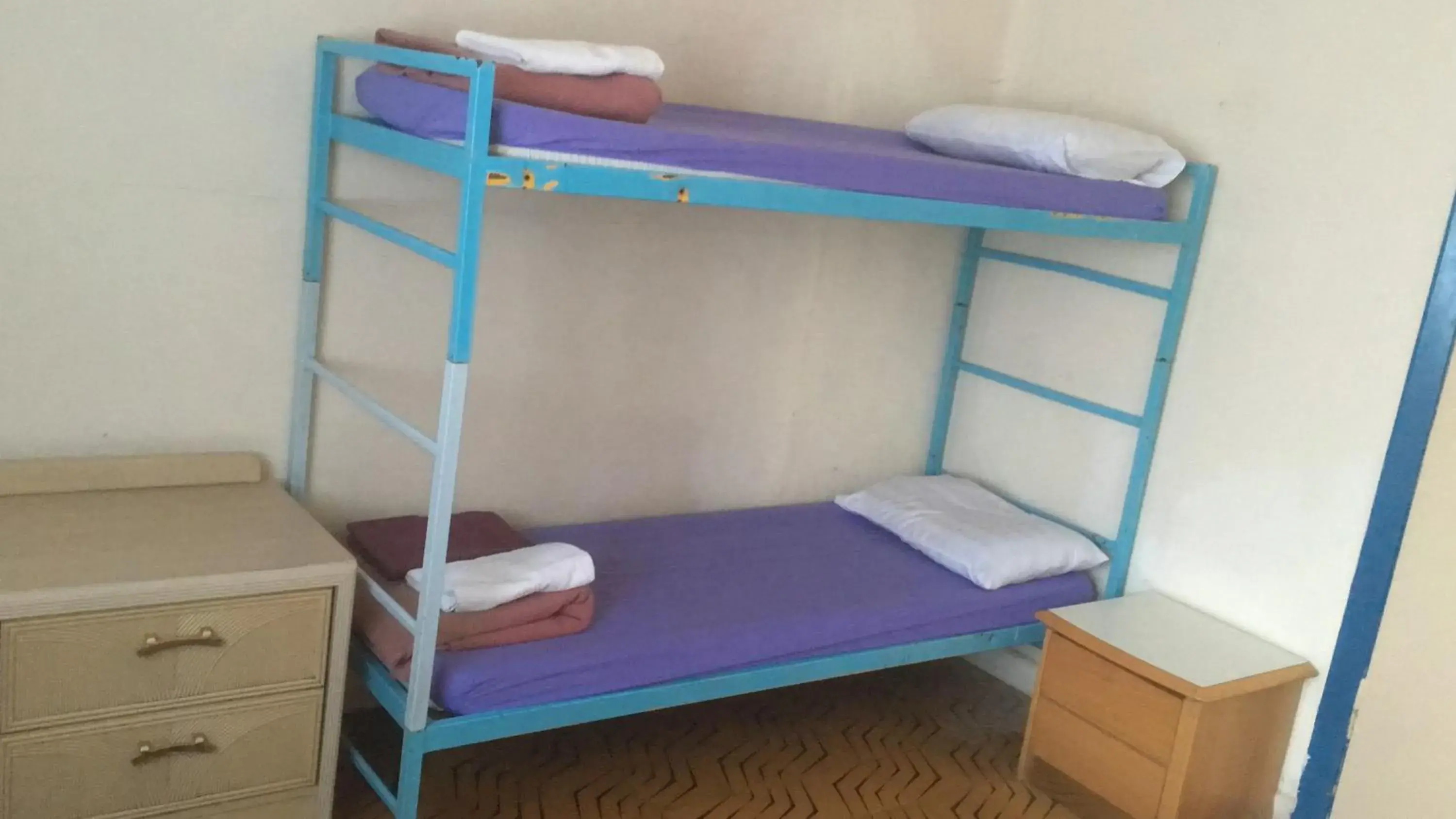 Single Bed in Male Dormitory Room in Sky Hostel