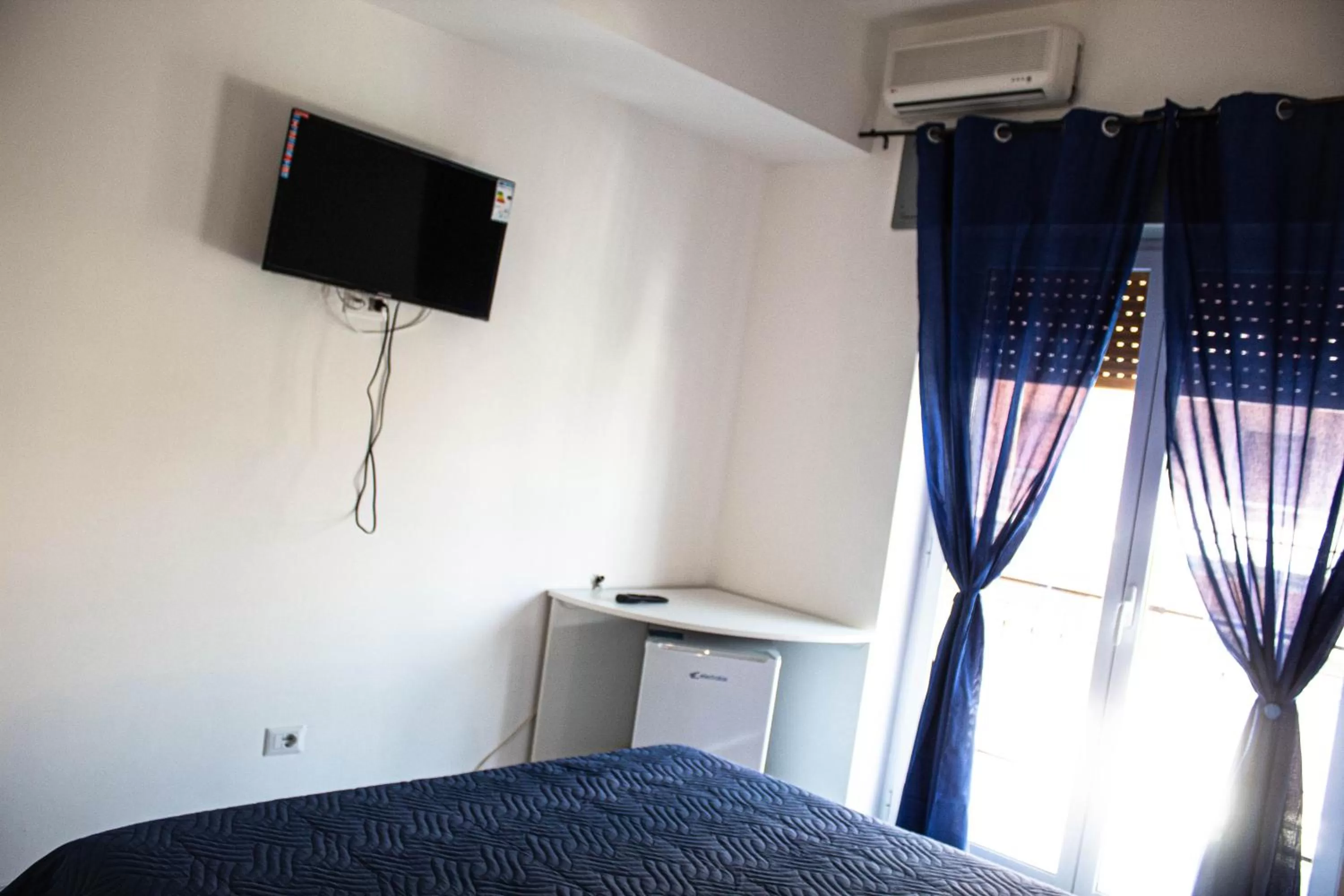 Bed, TV/Entertainment Center in Bed end Breakfast Mediterraneo