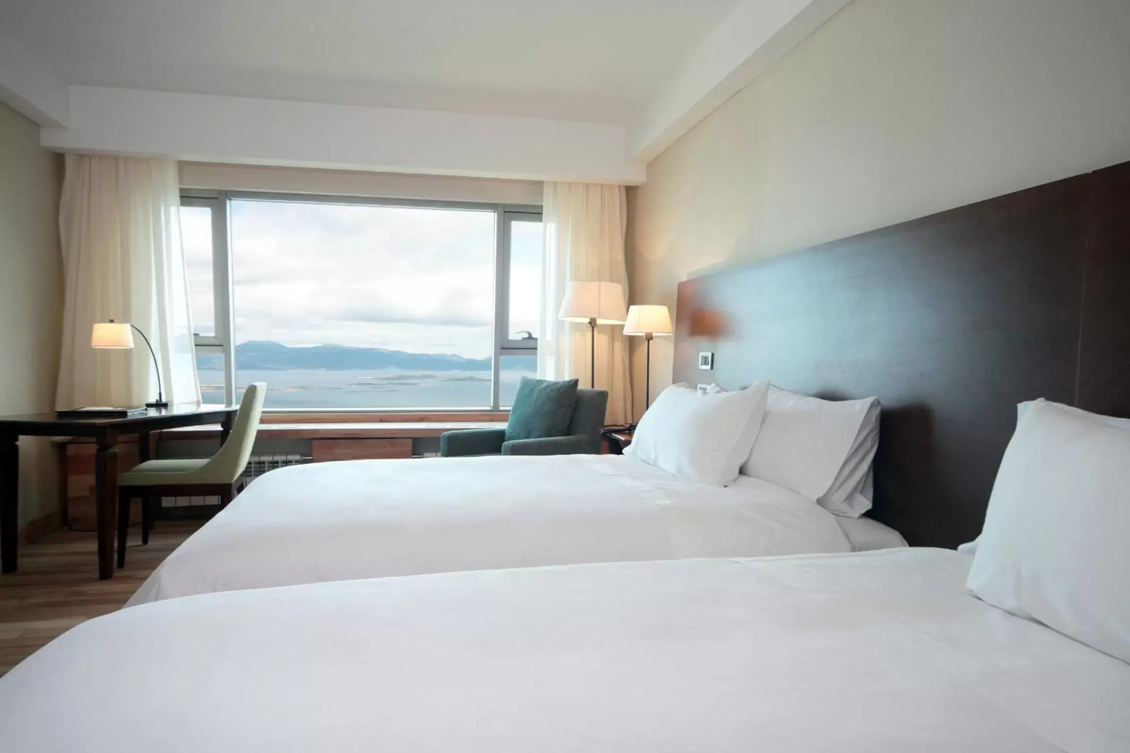 Photo of the whole room, Bed in Arakur Ushuaia Resort & Spa