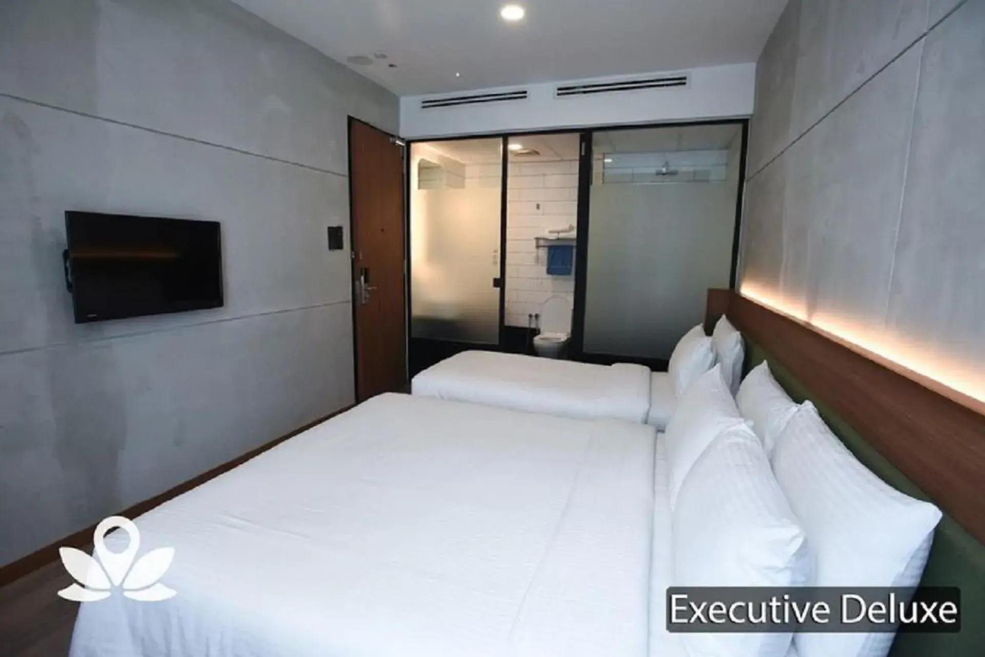 Bed in Ceria Hotel