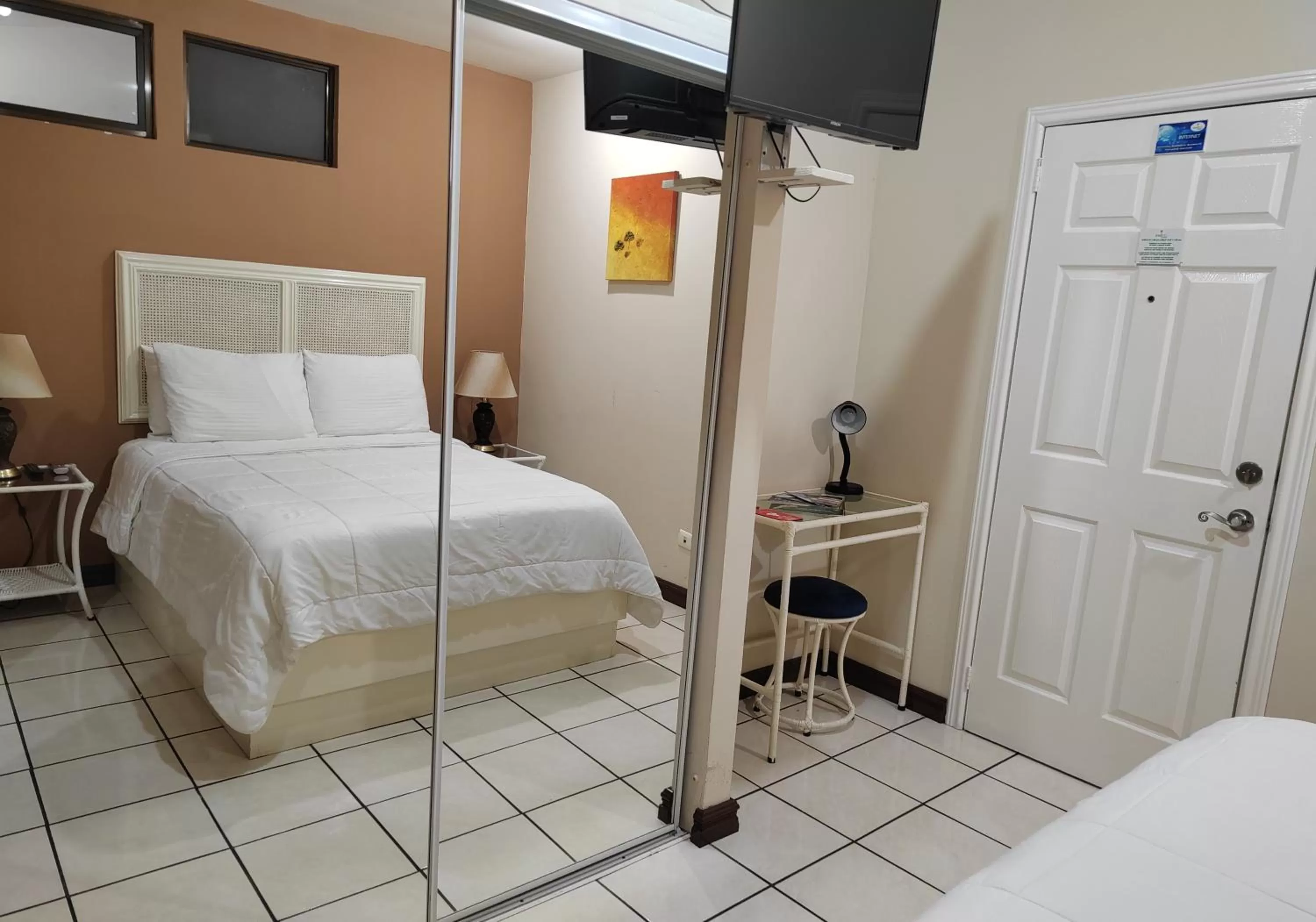 Bed in Hotel Bamboo Aeropuerto