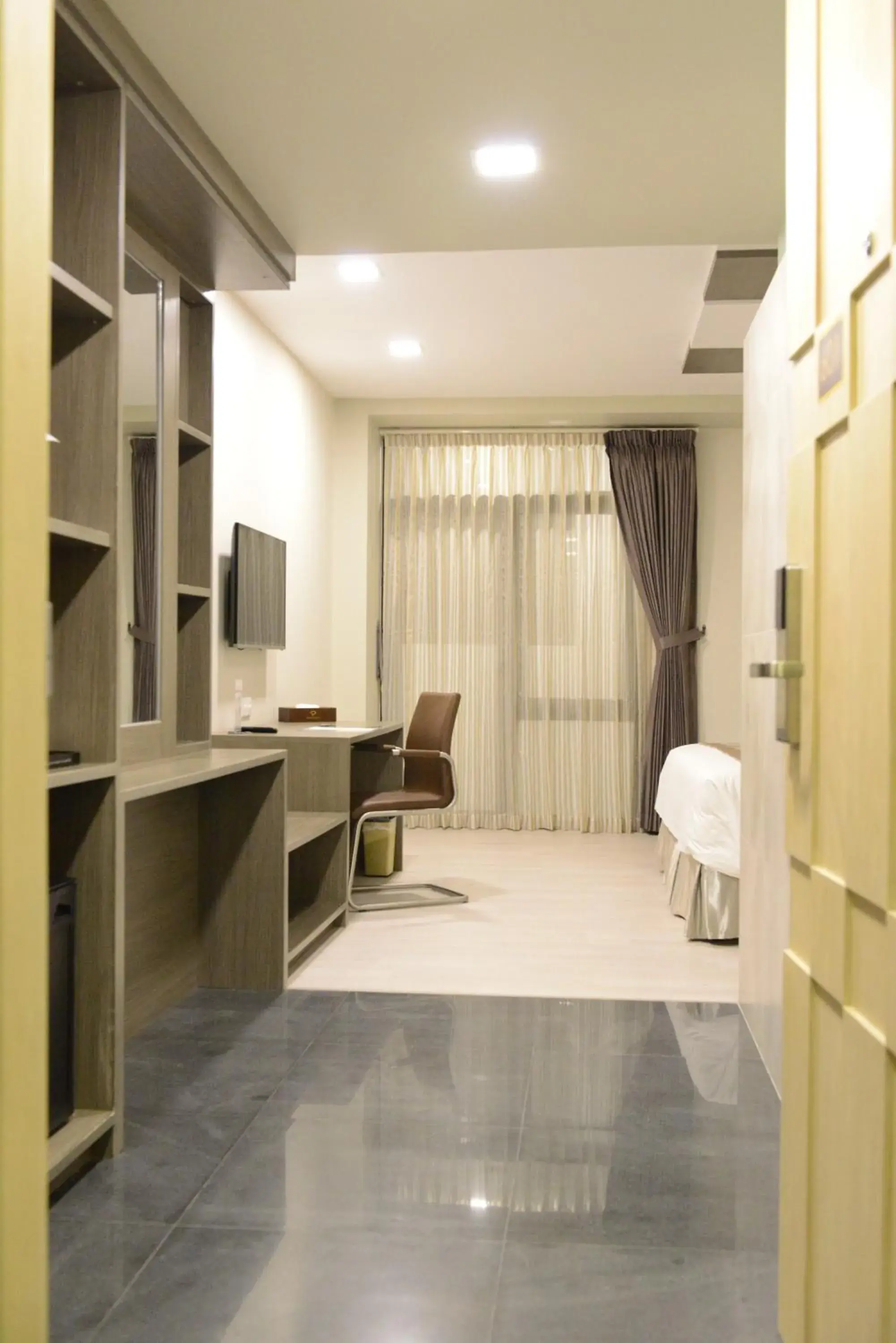 Bedroom, Seating Area in Hotel Parami