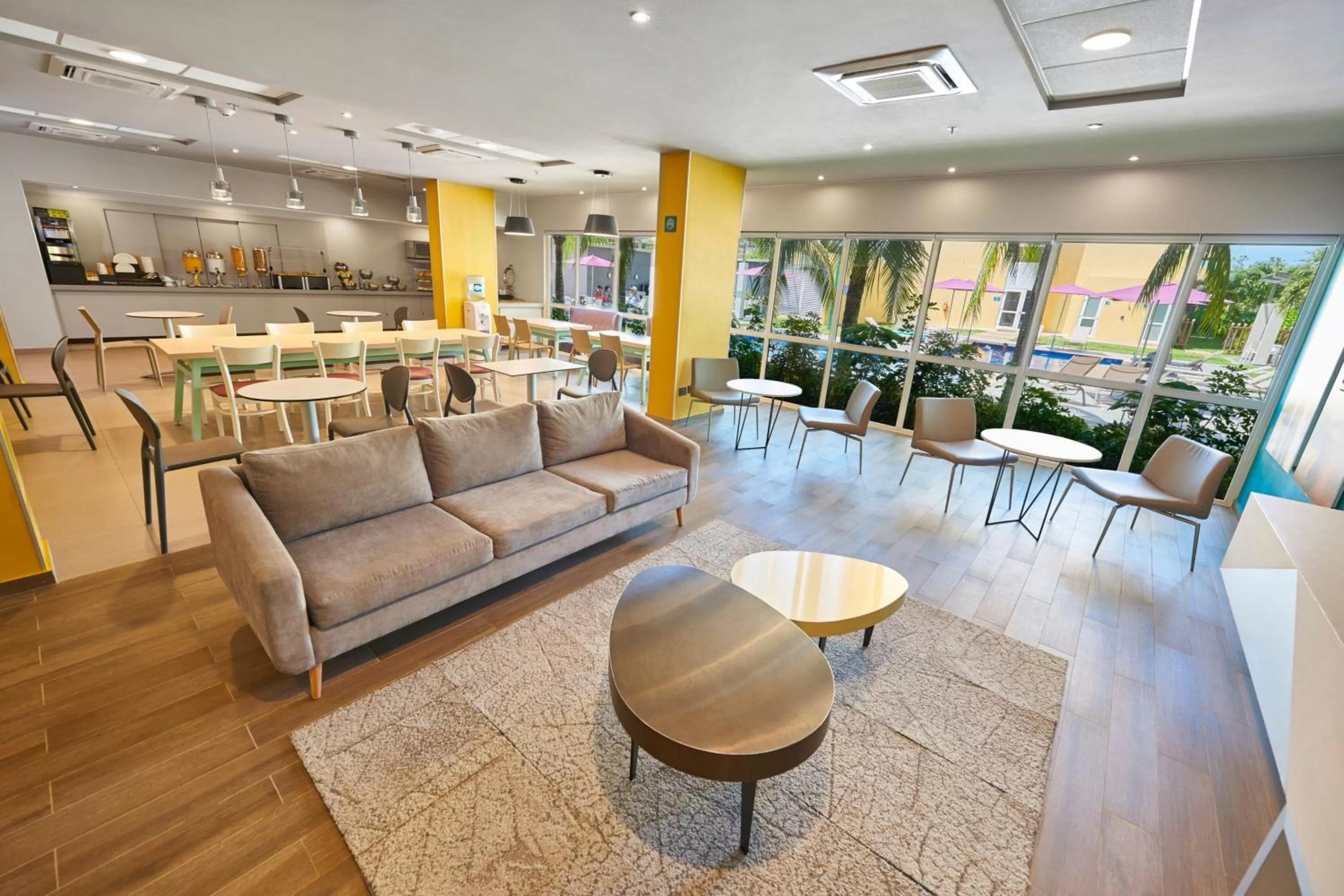 Lobby or reception in City Express Suites by Marriott Playa del Carmen