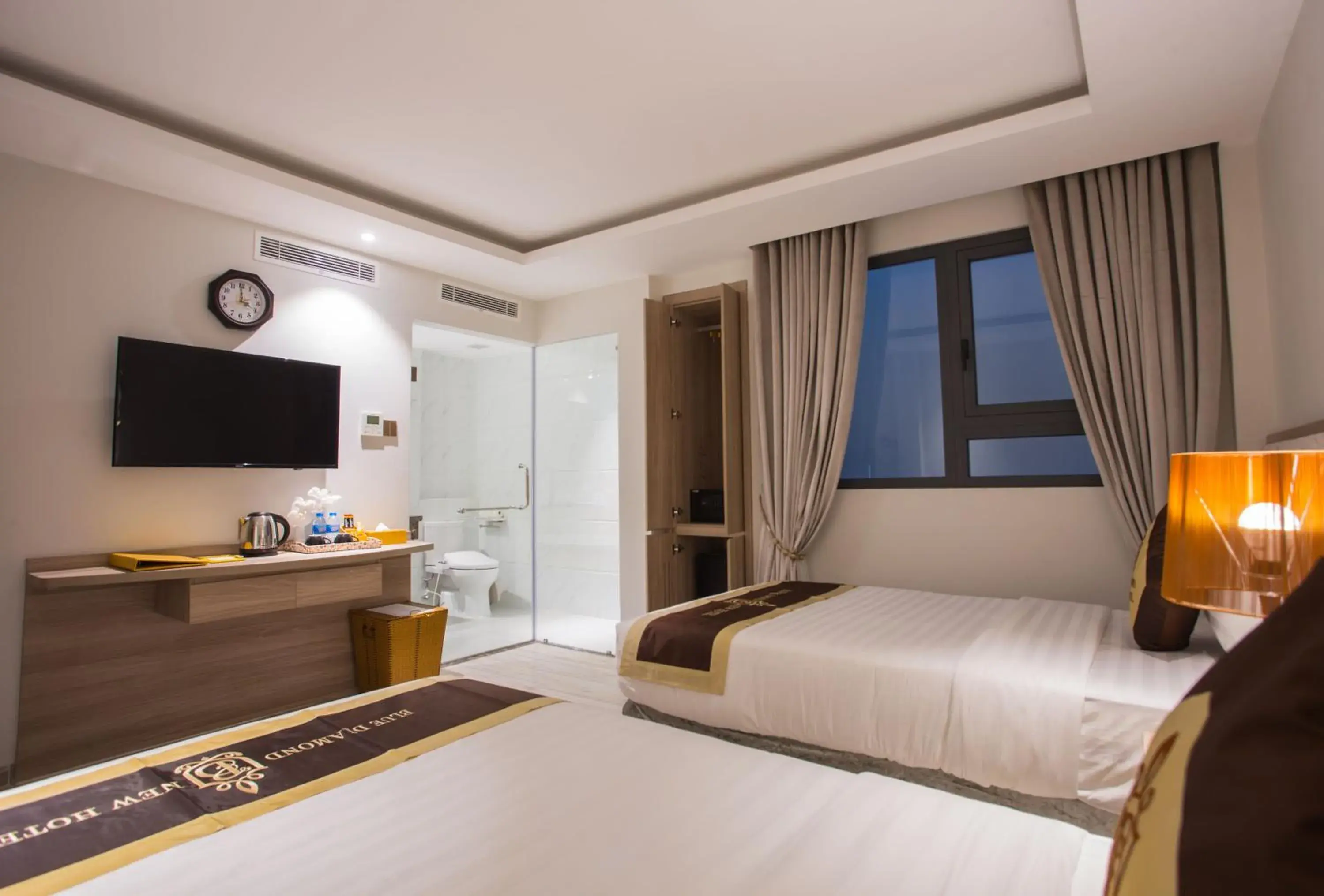 Bedroom, TV/Entertainment Center in BLUE DIAMOND 8B Hotel Bedroom, TV/Entertainment Center in BLUE DIAMOND 8B Hotel