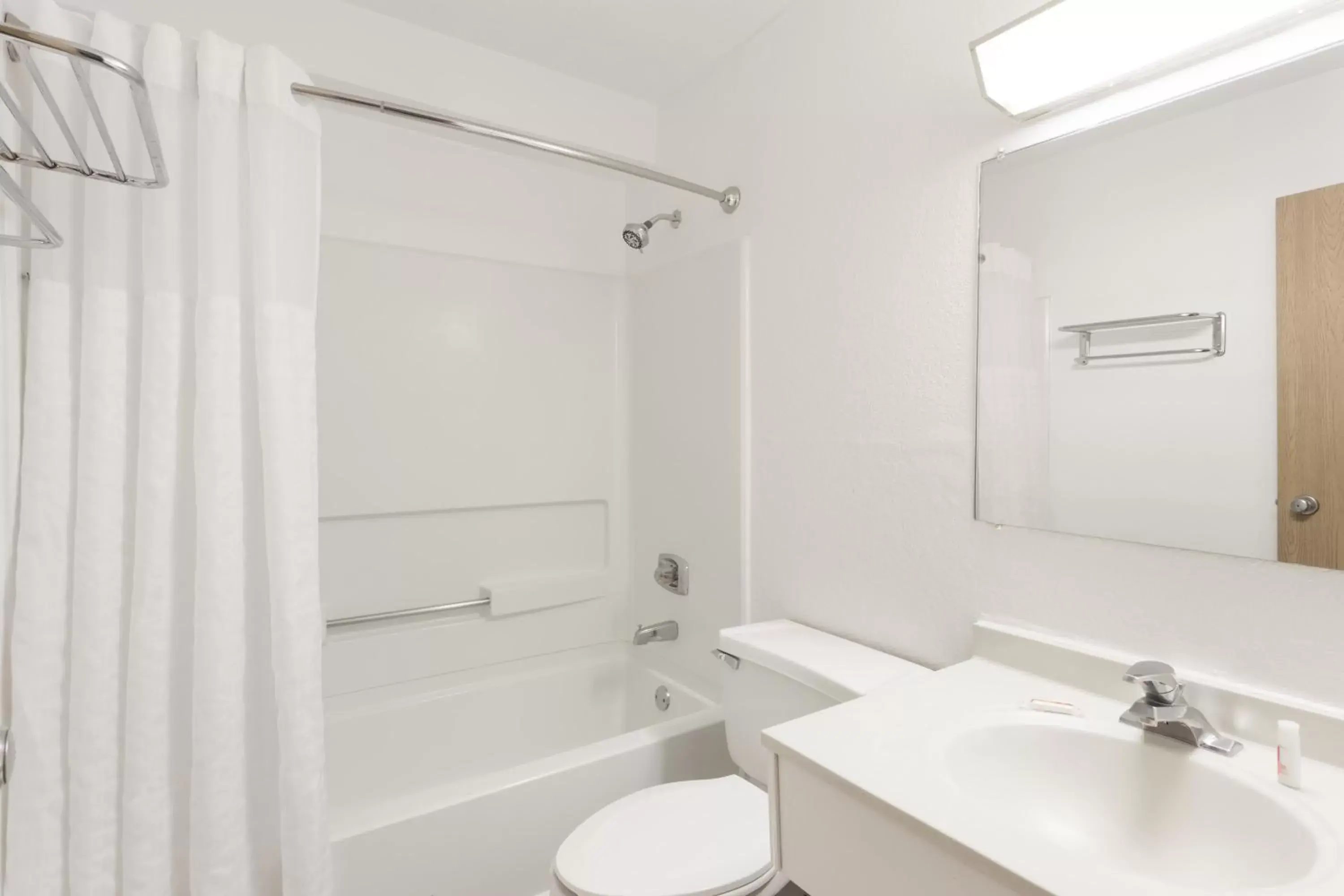 Toilet, Bathroom in Super 8 by Wyndham Mundelein/Libertyville Area