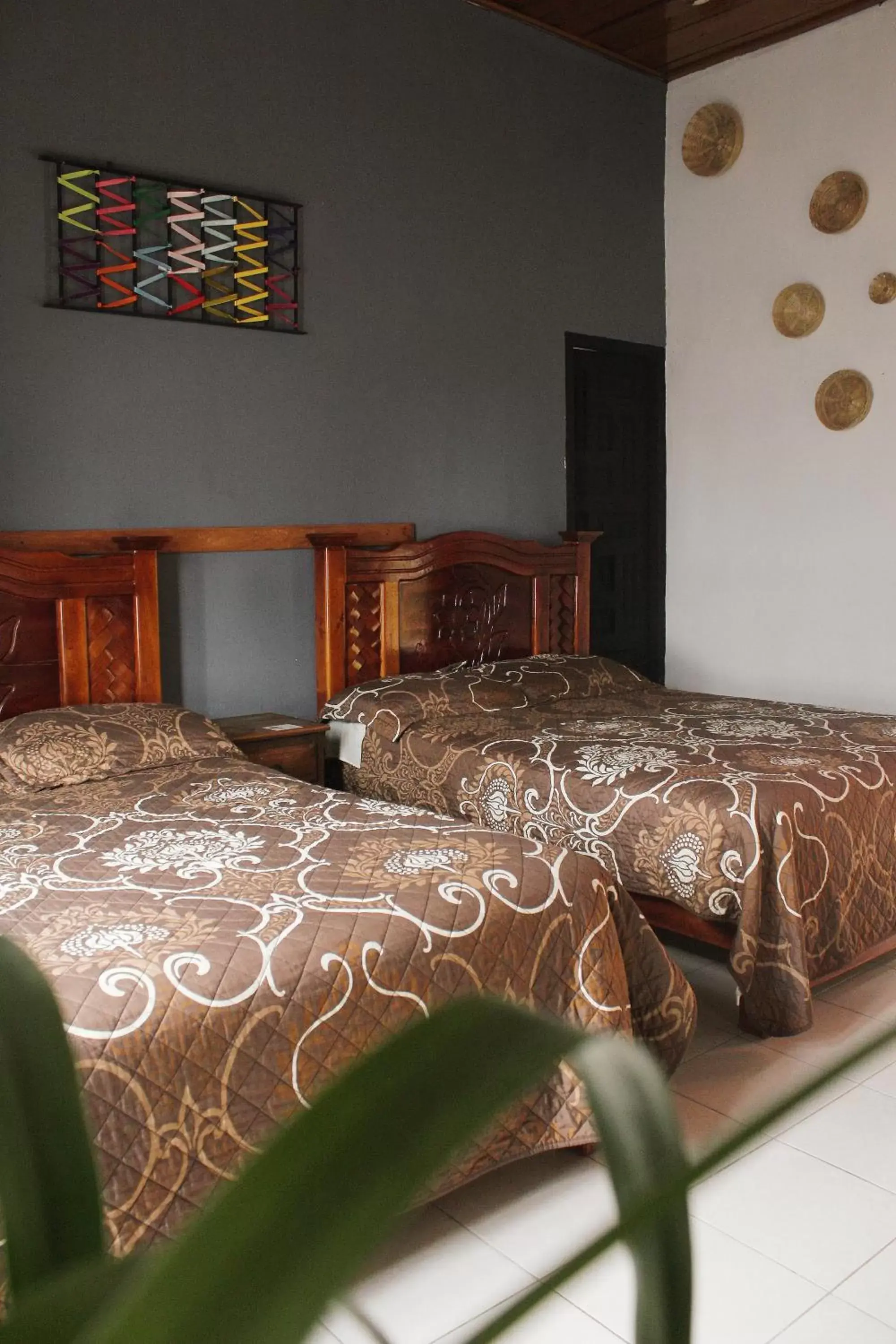 Bed in El Naranjo Hotel Finca Urbana
