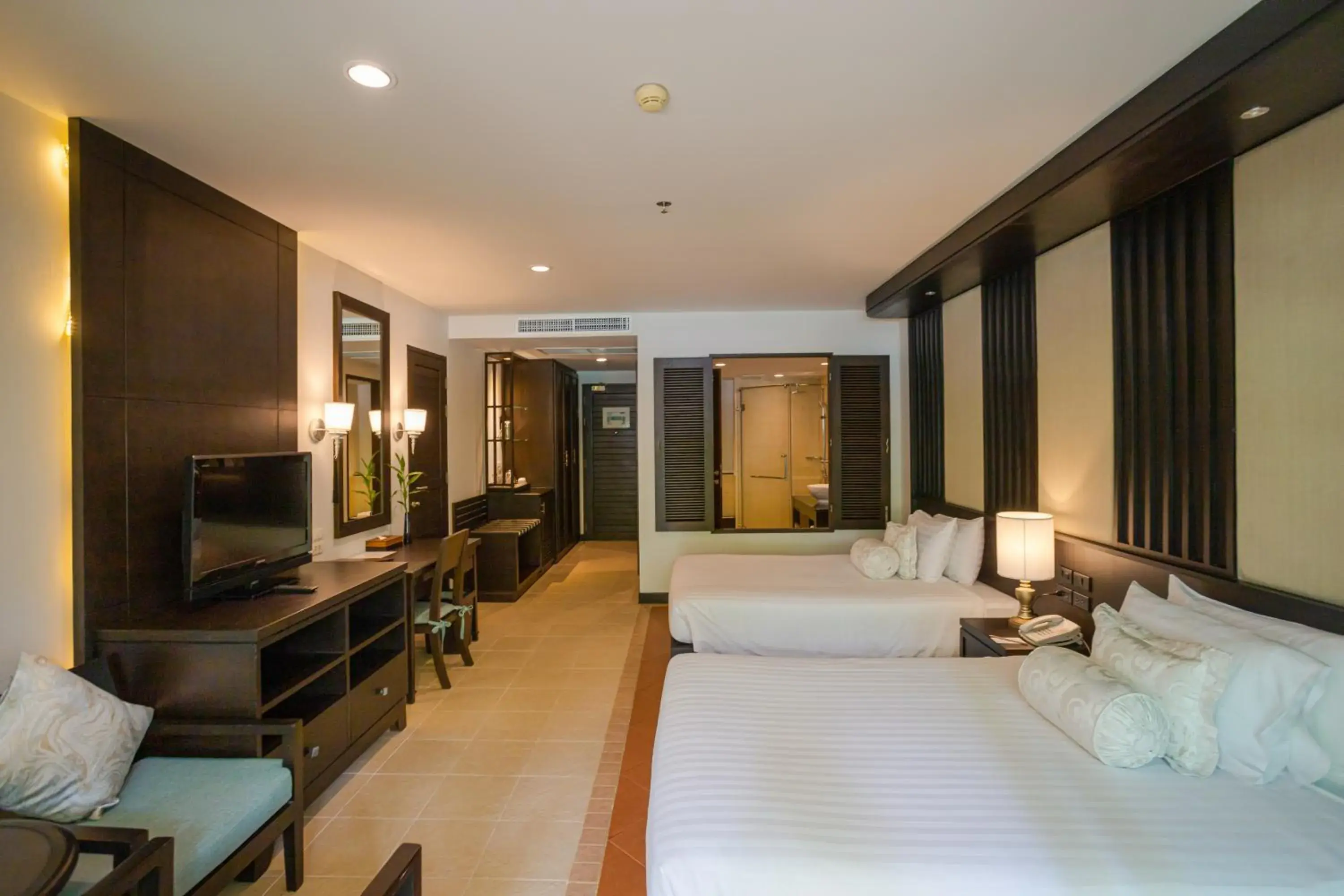Bedroom, TV/Entertainment Center in Ravindra Beach Resort & Spa - SHA Extra Plus