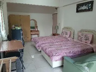 Bed in Vanlisut Hotel Ngamwongwan