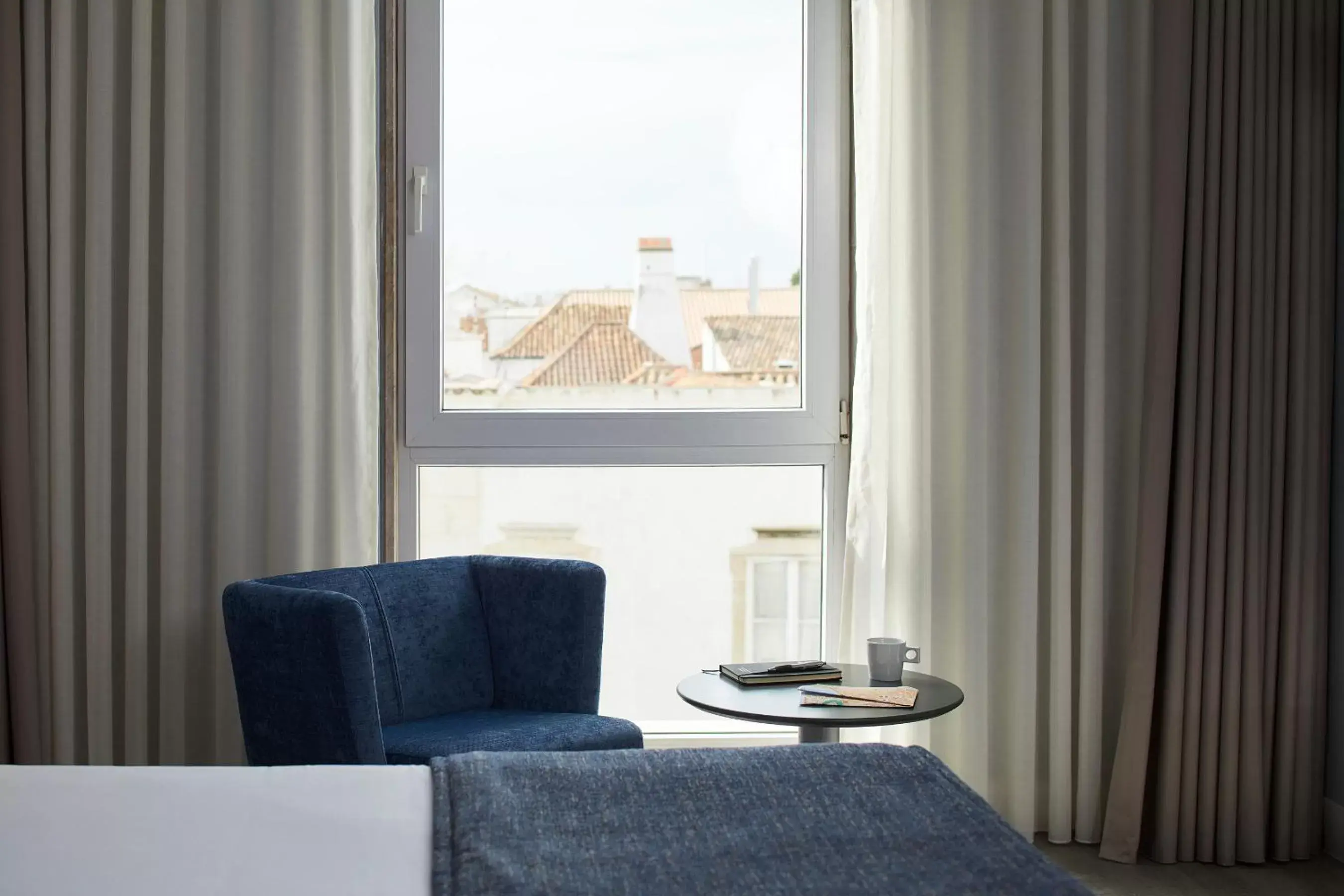 Bedroom, Seating Area in Hotel Faro & Beach Club