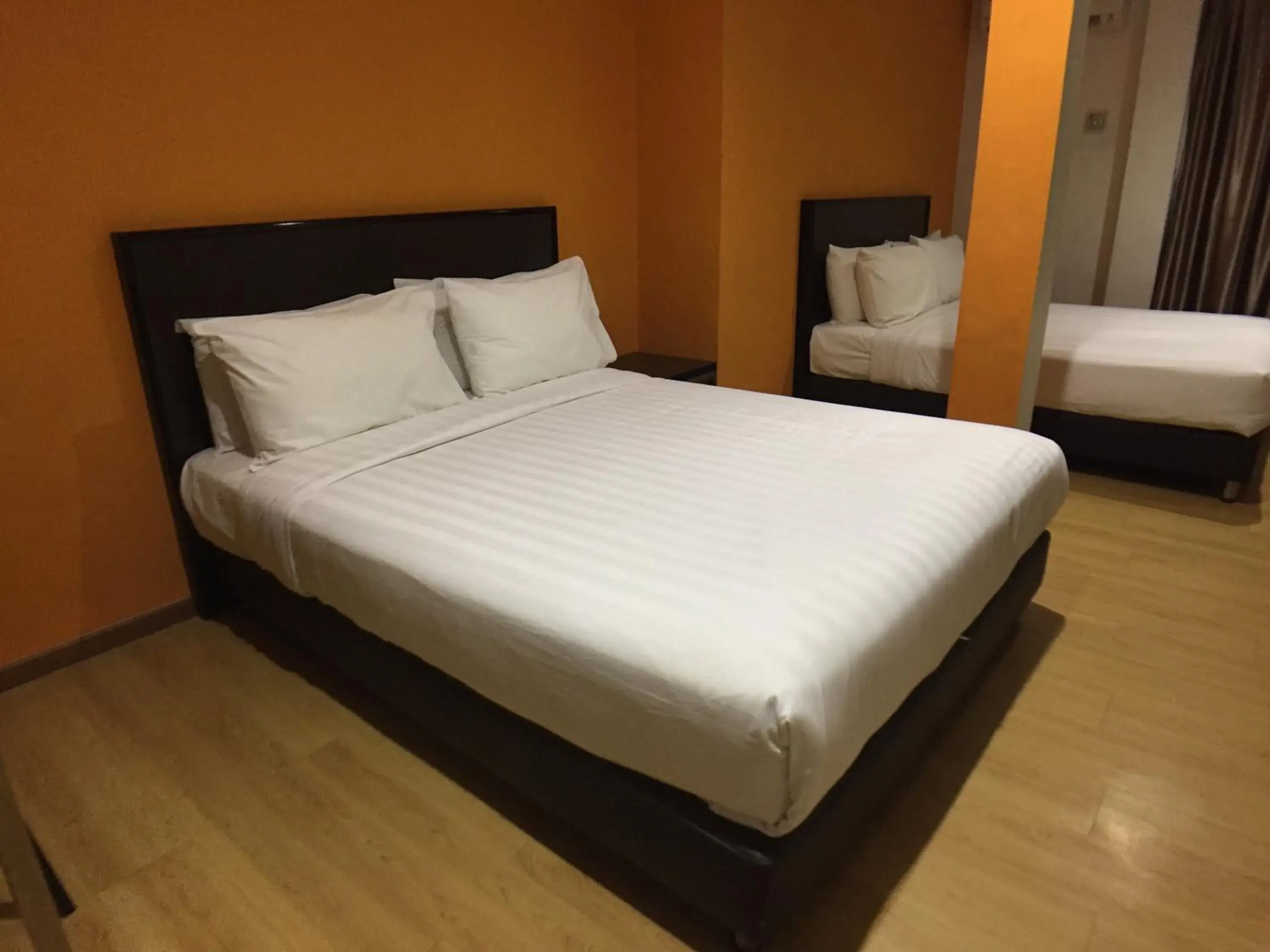 Bed in Padungan Hotel